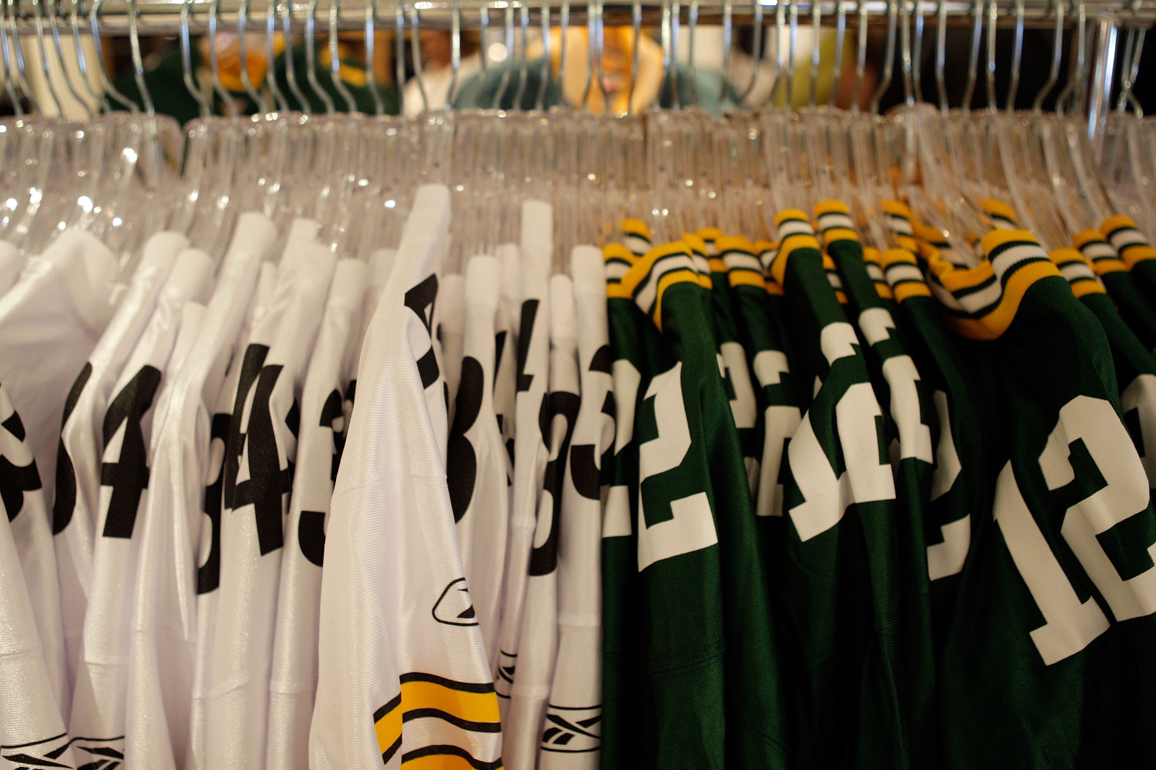 ARLINGTON, TX - FEBRUARY 06:  Pittsburgh Steelers and Green Bay Packers jerseys are displayed inside the Pro Shop at Cowboys Stadium before Super Bowl XLV on February 6, 2011 in Arlington, Texas.  (Photo by Jamie Squire/Getty Images)