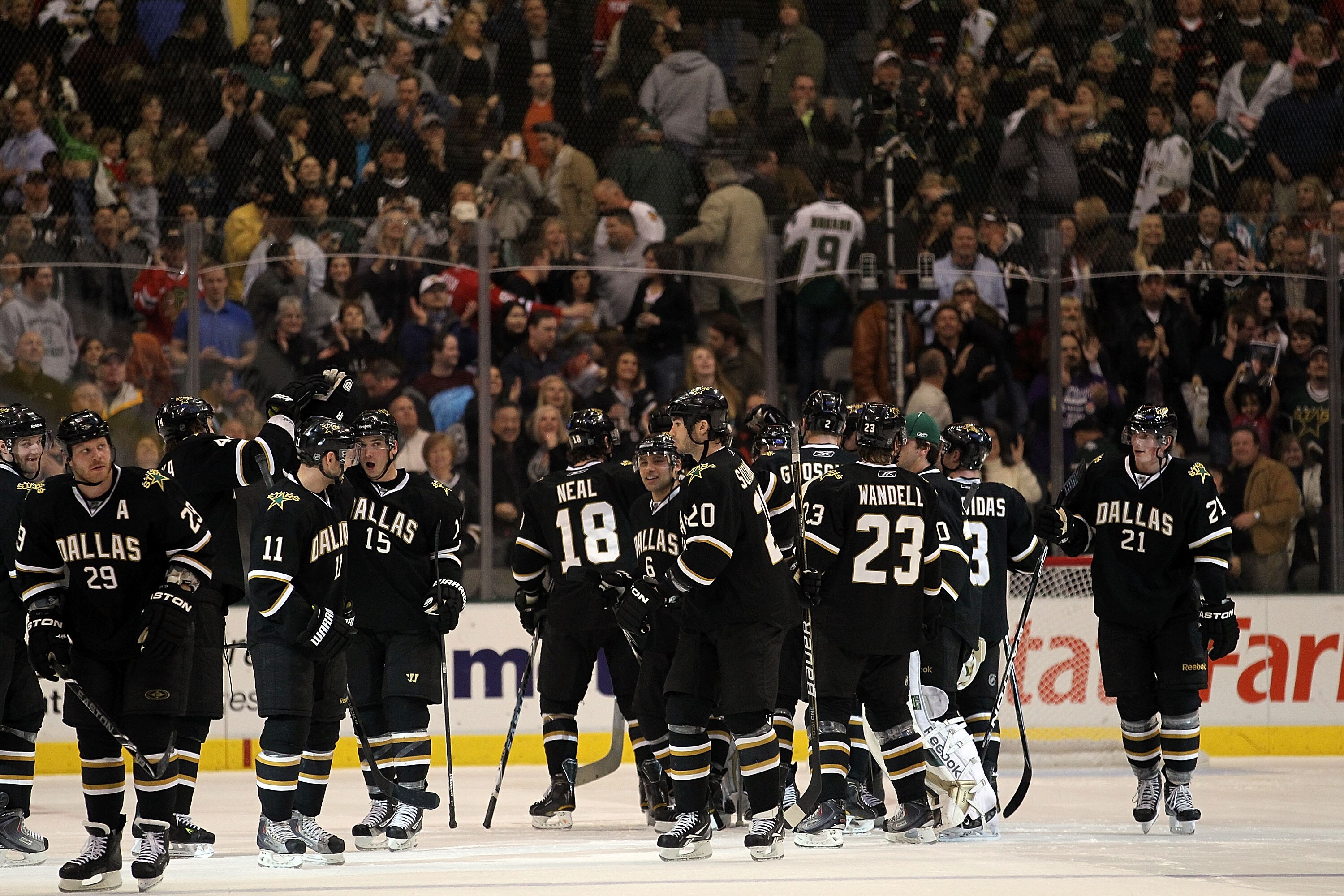 DALLAS, TX - FEBRUARY 11:  The Dallas Stars celebrate the overtime win against the Chicago Blackhawks at American Airlines Center on February 11, 2011 in Dallas, Texas.  (Photo by Ronald Martinez/Getty Images)