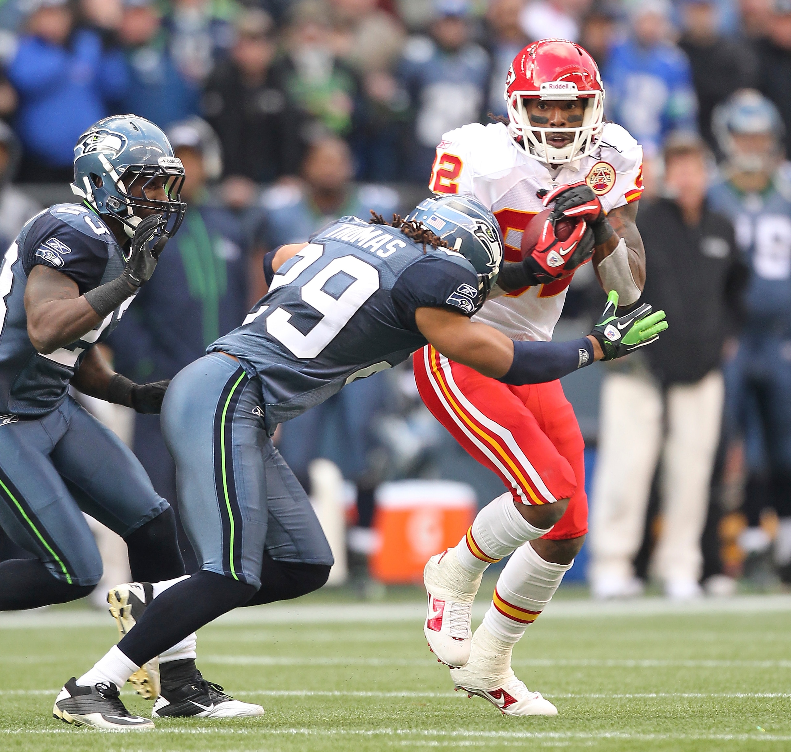 SEATTLE - NOVEMBER 28: Wide receiver Dwayne Bowe #82 of the Kansas City Chiefs rushes against Earl Thomas #29 and Marcus Trufant #23 of the Seattle Seahawks at Qwest Field on November 28, 2010 in Seattle, Washington. The Chiefs defeated the Seahawks 42-2 SEATTLE - NOVEMBER 28: Wide receiver Dwayne Bowe #82 of the Kansas City Chiefs rushes against Earl Thomas #29 and Marcus Trufant #23 of the Seattle Seahawks at Qwest Field on November 28, 2010 in Seattle, Washington. The Chiefs defeated the Seahawks 42-2