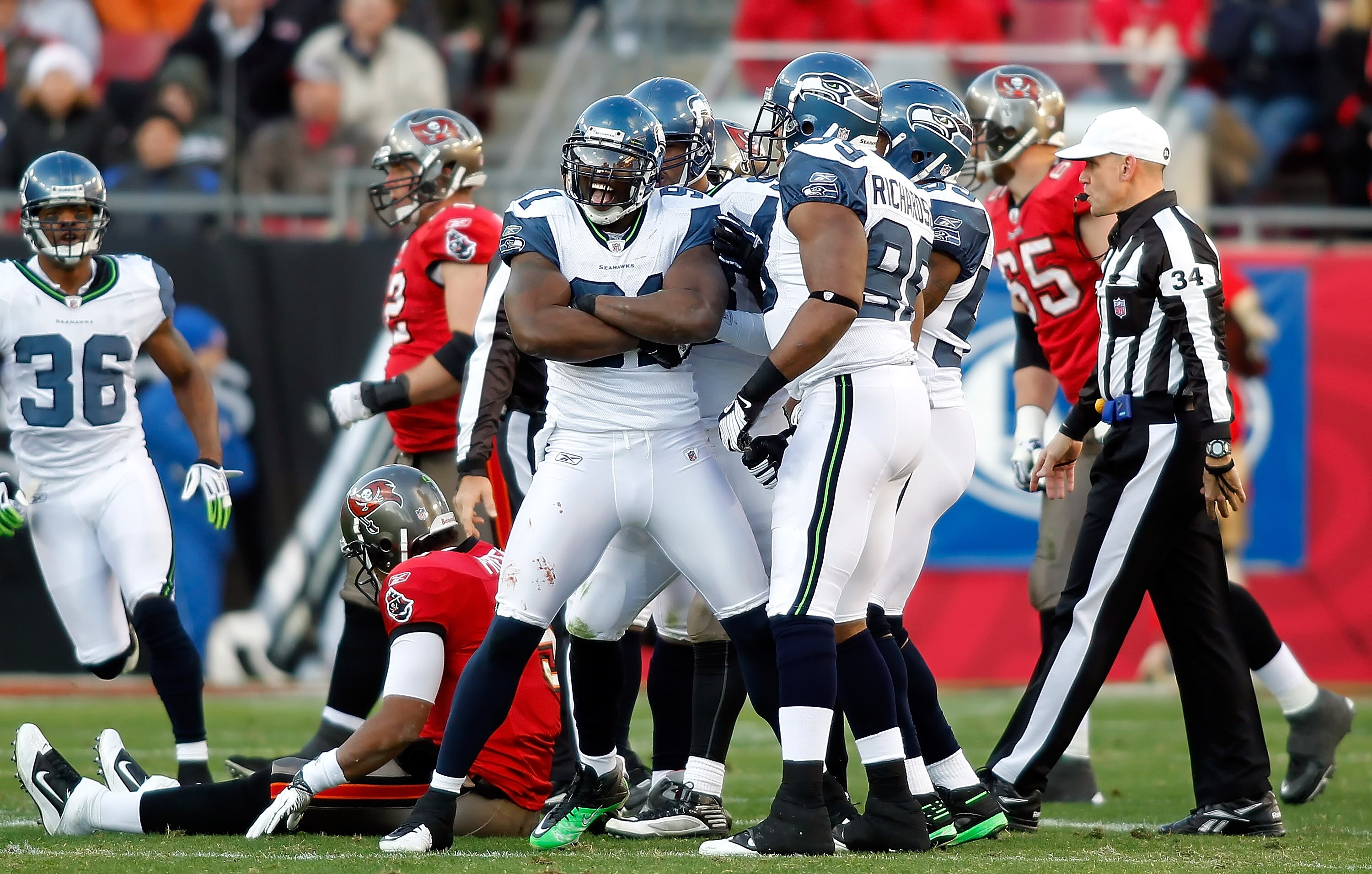 TAMPA, FL - DECEMBER 26: Defensive end Chris Clemons #91 of the Seattle Seahawks celebrates a sack against the Tampa Bay Buccaneers during the game at Raymond James Stadium on December 26, 2010 in Tampa, Florida. (Photo by J. Meric/Getty Images)