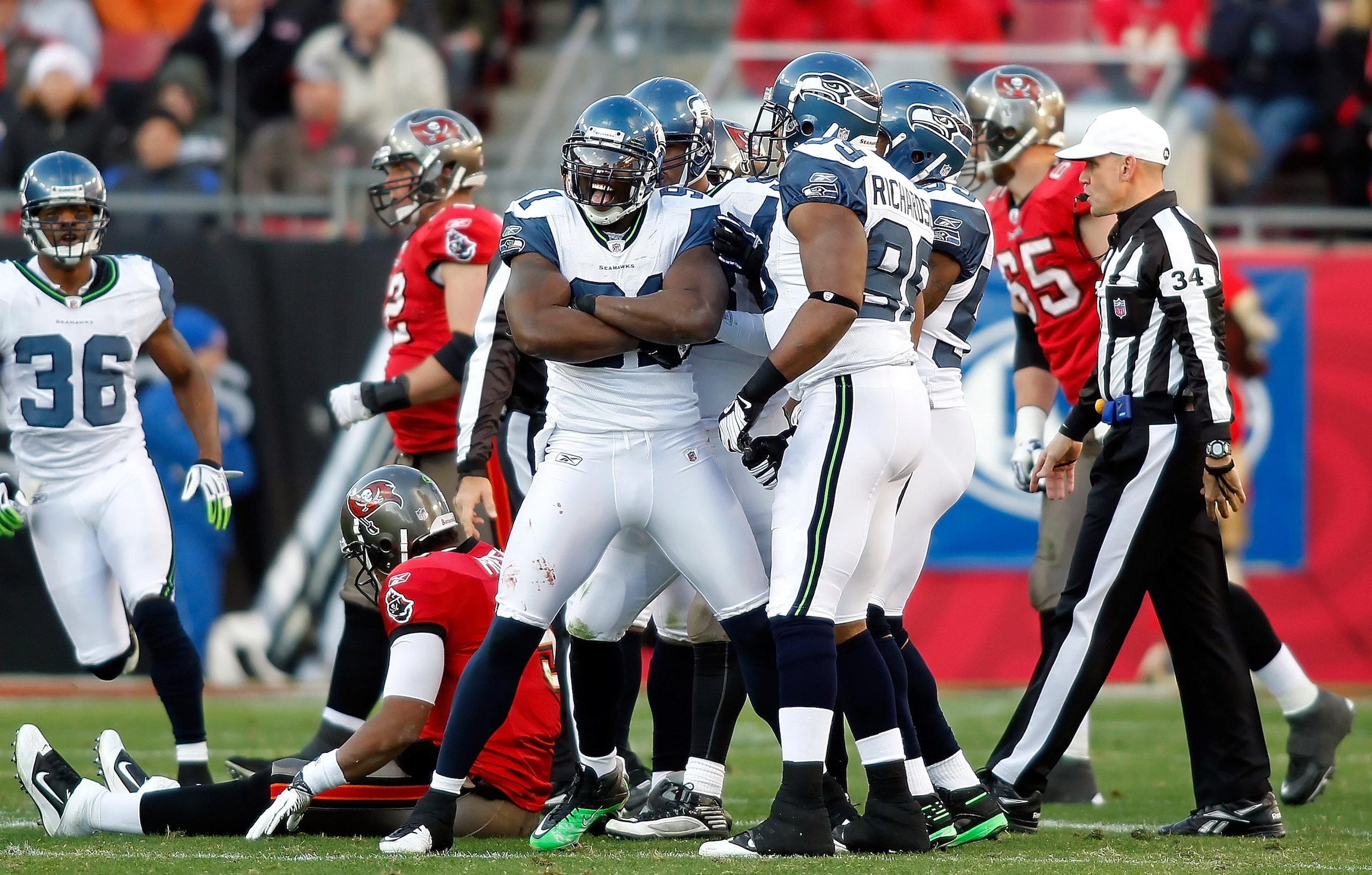 TAMPA, FL - DECEMBER 26: Defensive end Chris Clemons #91 of the Seattle Seahawks celebrates a sack against the Tampa Bay Buccaneers during the game at Raymond James Stadium on December 26, 2010 in Tampa, Florida. (Photo by J. Meric/Getty Images) TAMPA, FL - DECEMBER 26: Defensive end Chris Clemons #91 of the Seattle Seahawks celebrates a sack against the Tampa Bay Buccaneers during the game at Raymond James Stadium on December 26, 2010 in Tampa, Florida. (Photo by J. Meric/Getty Images)