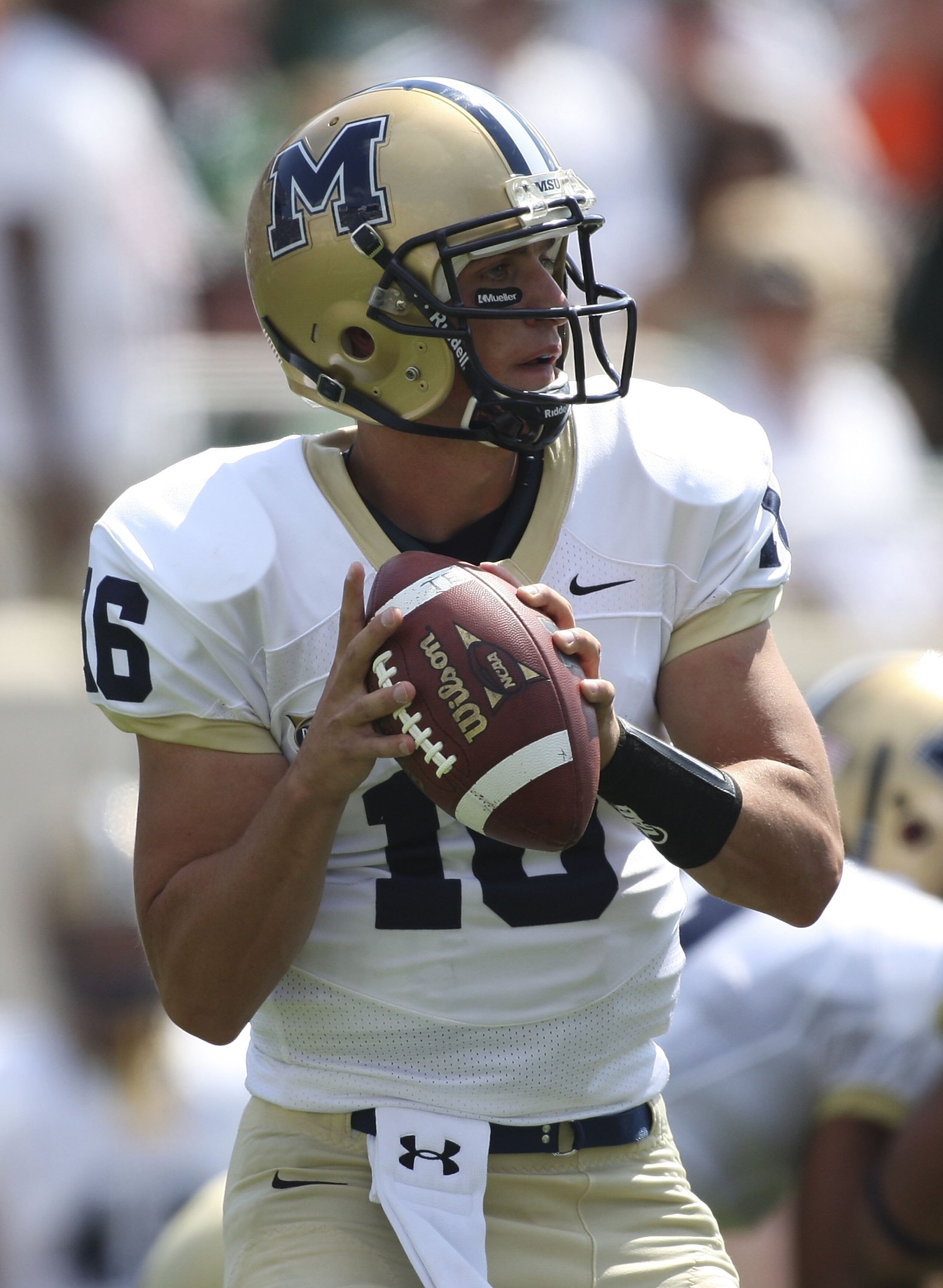EAST LANSING, MI - SEPTEMBER 05:  Mark Iddins #16 of the Montana State Bobcats drops back to pass against the Michigan State Spartans in the third quarter on September 5, 2009 at Spartan Stadium in East Lansing, Michigan.  (Photo by Leon Halip/Getty Image