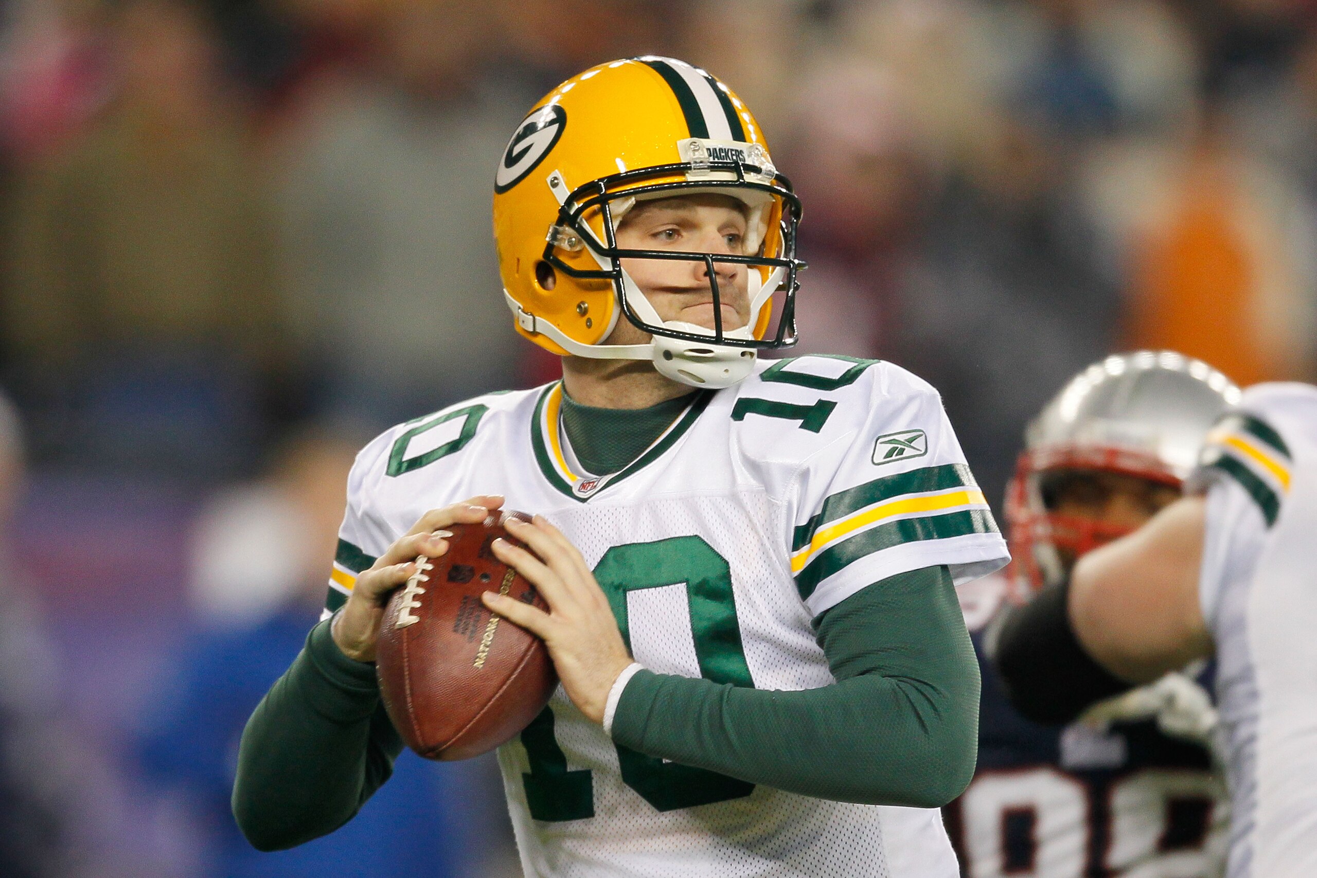 FOXBORO, MA - DECEMBER 19:  Quarterback Matt Flynn #10 of the Green Bay Packers looks to pass during the first quarter of the game against the New England Patriots at Gillette Stadium on December 19, 2010 in Foxboro, Massachusetts. The Patriots won the ga