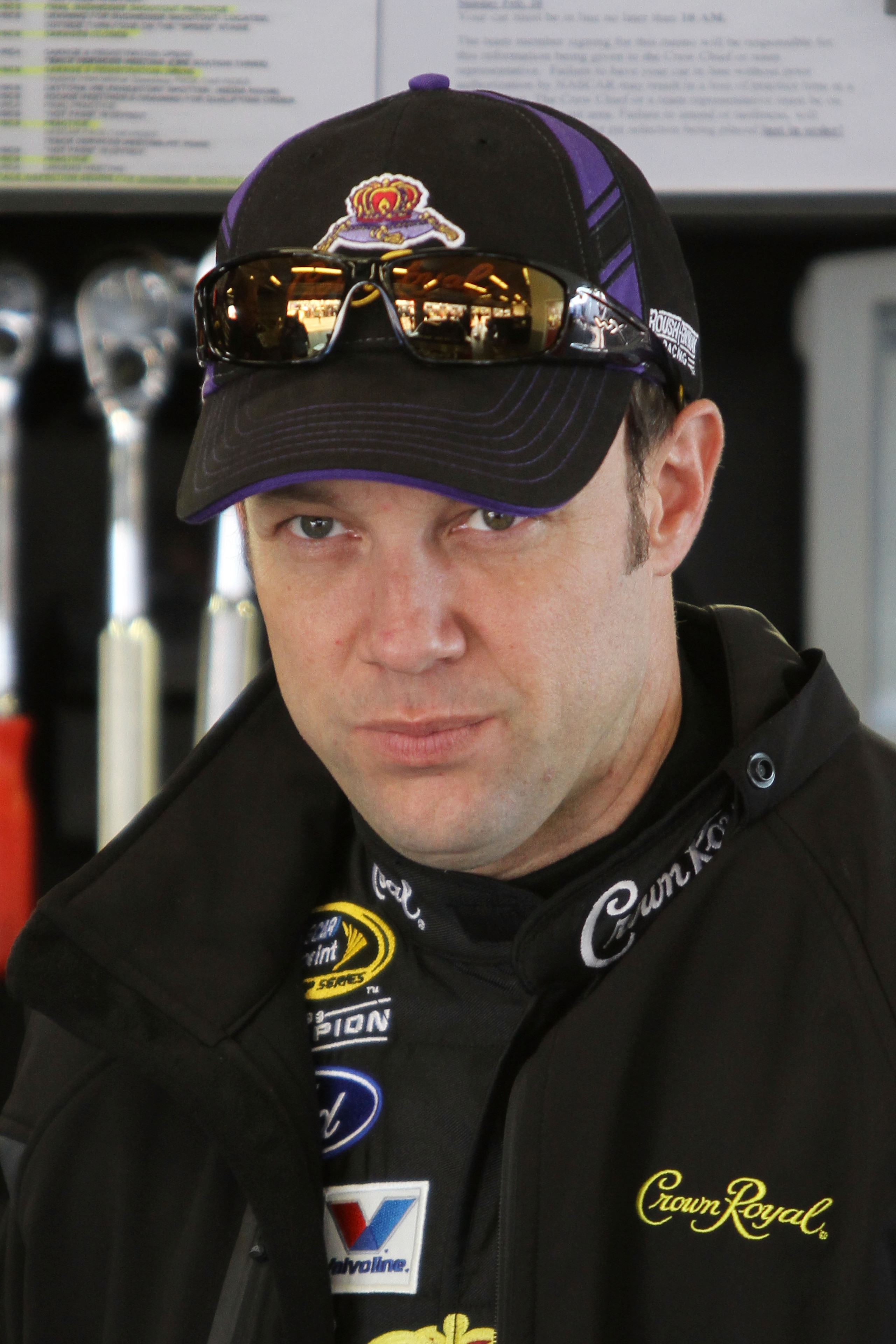 DAYTONA BEACH, FL - FEBRUARY 11:  Matt Kenseth, driver of the #17 Crown Royal Ford, stands in the garage during practice for the NASCAR Budweiser Shootout at Daytona International Speedway on February 11, 2011 in Daytona Beach, Florida.  (Photo by Jerry M