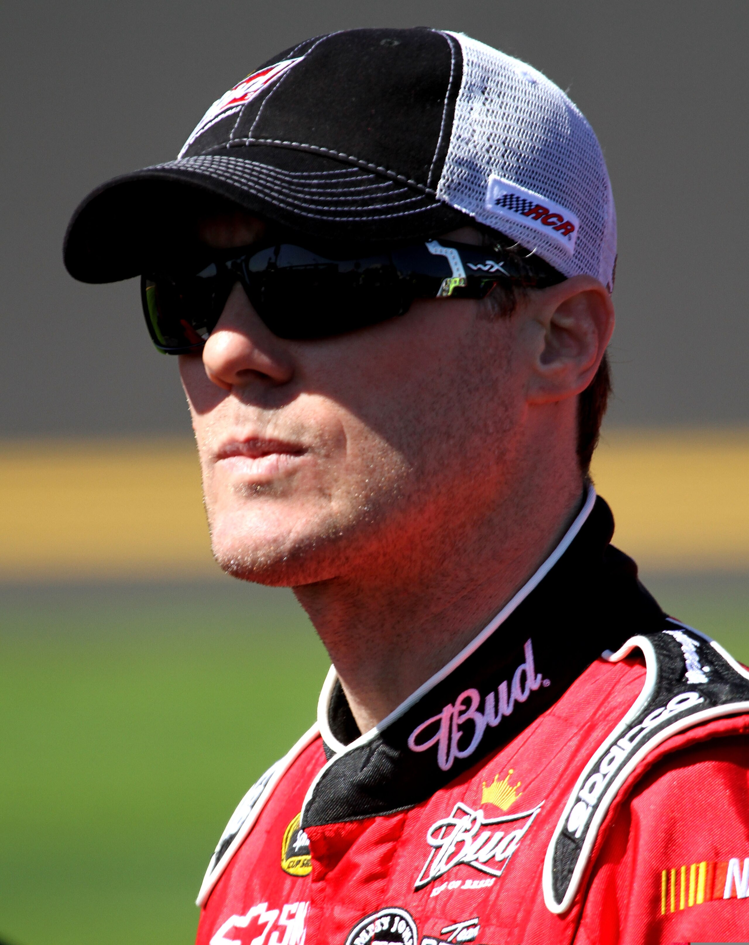 DAYTONA BEACH, FL - FEBRUARY 13:  Kevin Harvick, driver of the #29 Budweiser Chevrolet, stands on the grid during qualifying for the NASCAR Sprint Cup Series Daytona 500 at Daytona International Speedway on February 13, 2011 in Daytona Beach, Florida.  (P