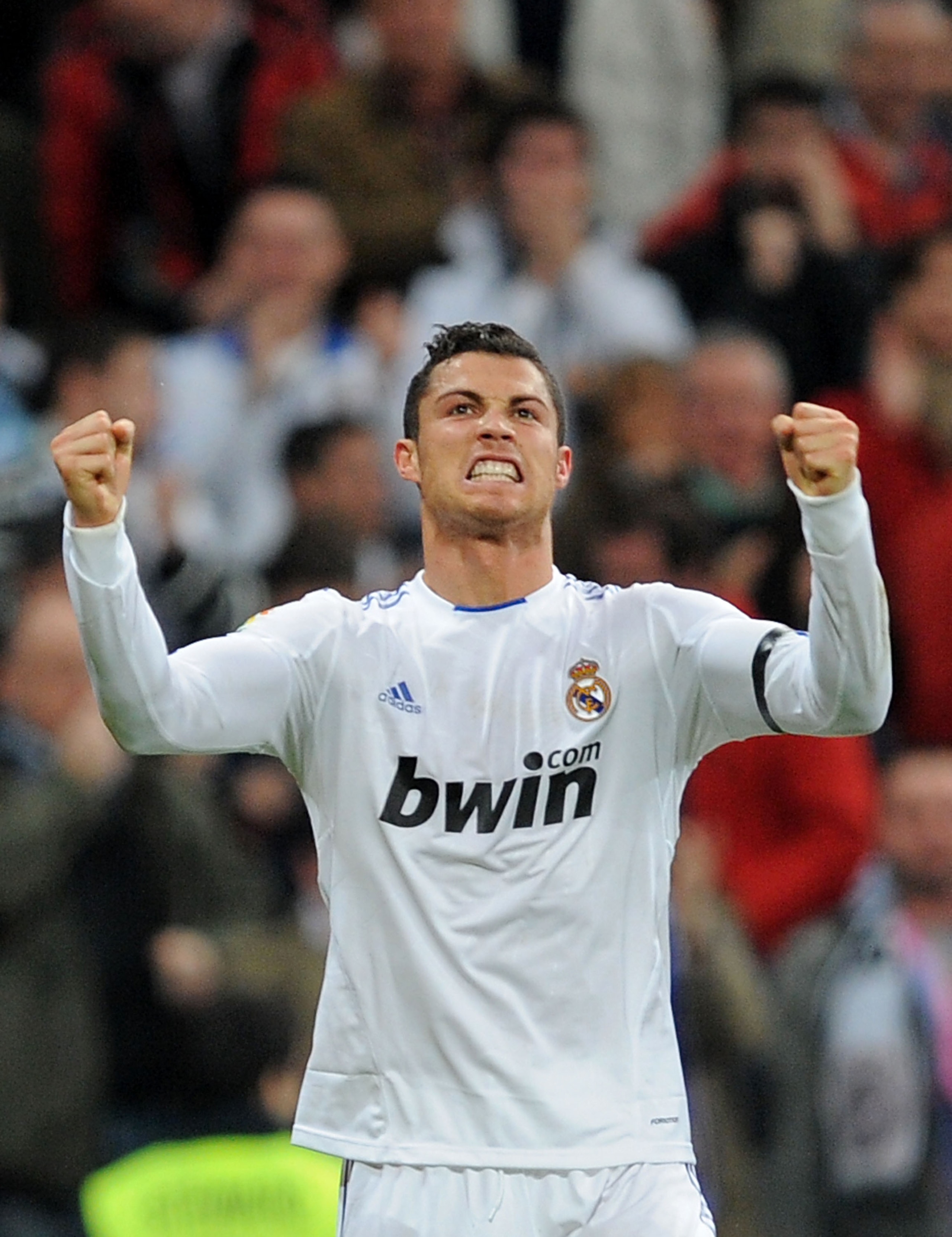MADRID, SPAIN - FEBRUARY 06:  Cristiano Ronaldo of Real Madrid celebrates after scoring Real's third goal during the La Liga match between Real Madrid and Real Sociedad at Estadio Santiago Bernabeu on February 6, 2011 in Madrid, Spain.  (Photo by Denis Do