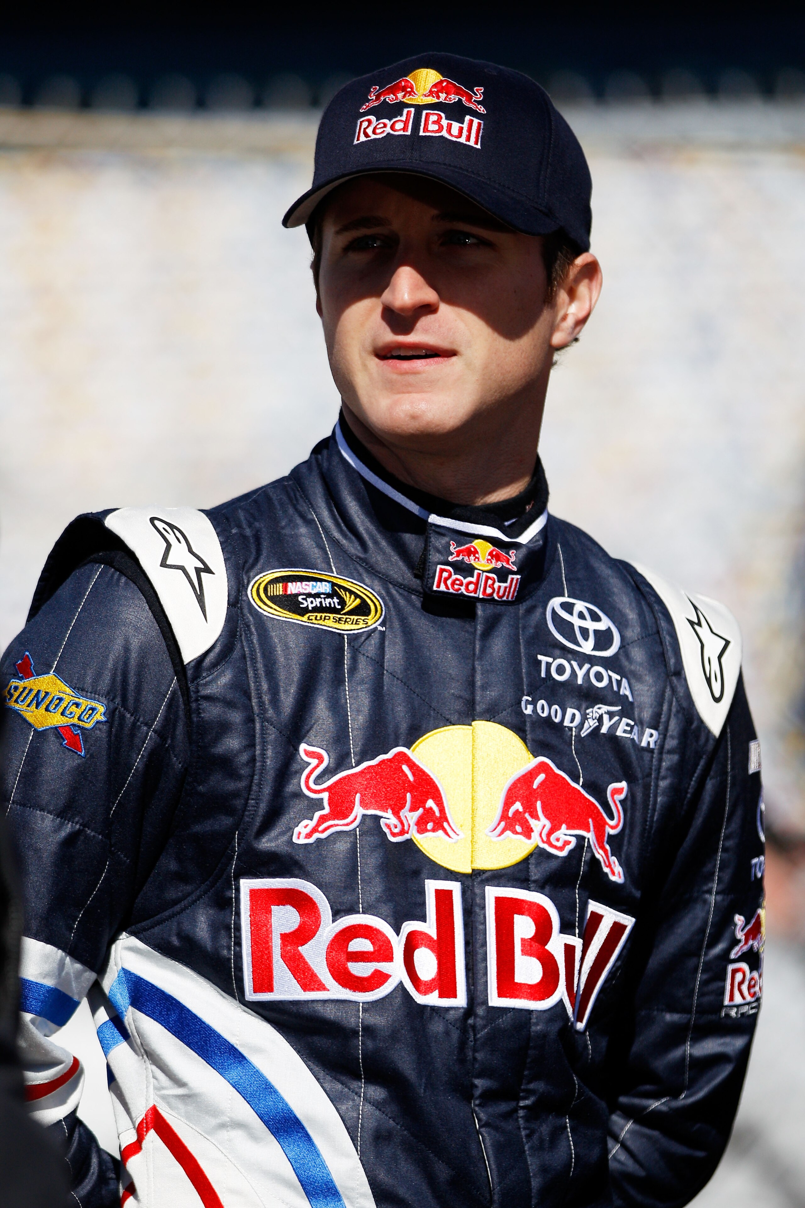 DAYTONA BEACH, FL - FEBRUARY 12:  Kasey Kahne, driver of the #4 Red Bull Toyota, stands in the garage area during practice for the NASCAR Sprint Cup Series Daytona 500 at Daytona International Speedway on February 12, 2011 in Daytona Beach, Florida.  (Pho