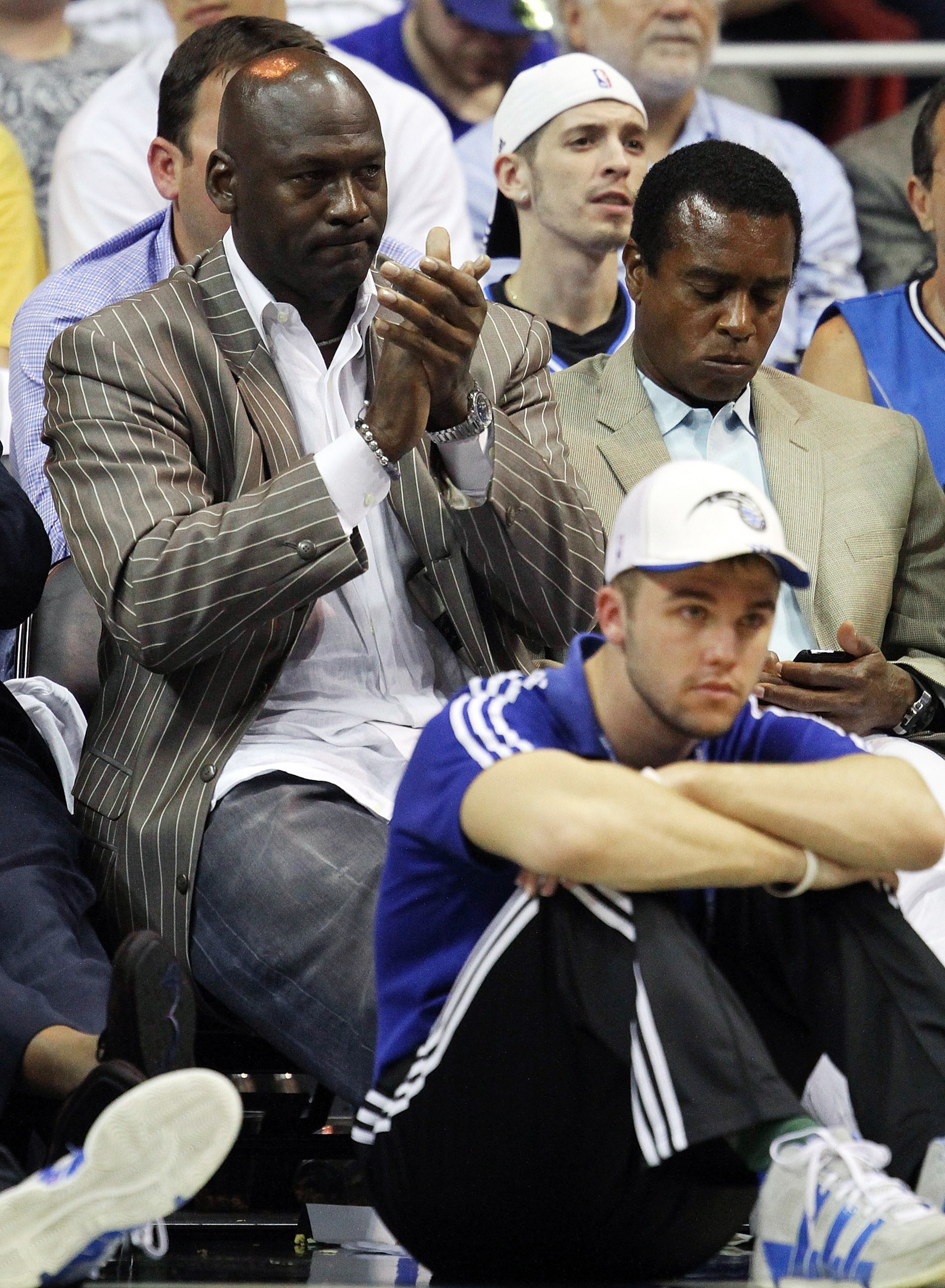 ORLANDO, FL - APRIL 18:  Owner Michael Jordan of the Charlotte Bobcats sits next to former NFL player Ahmad Rashad while watching his team take on the Orlando Magic in Game One of the Eastern Conference Quarterfinals during the 2010 NBA Playoffs at Amway