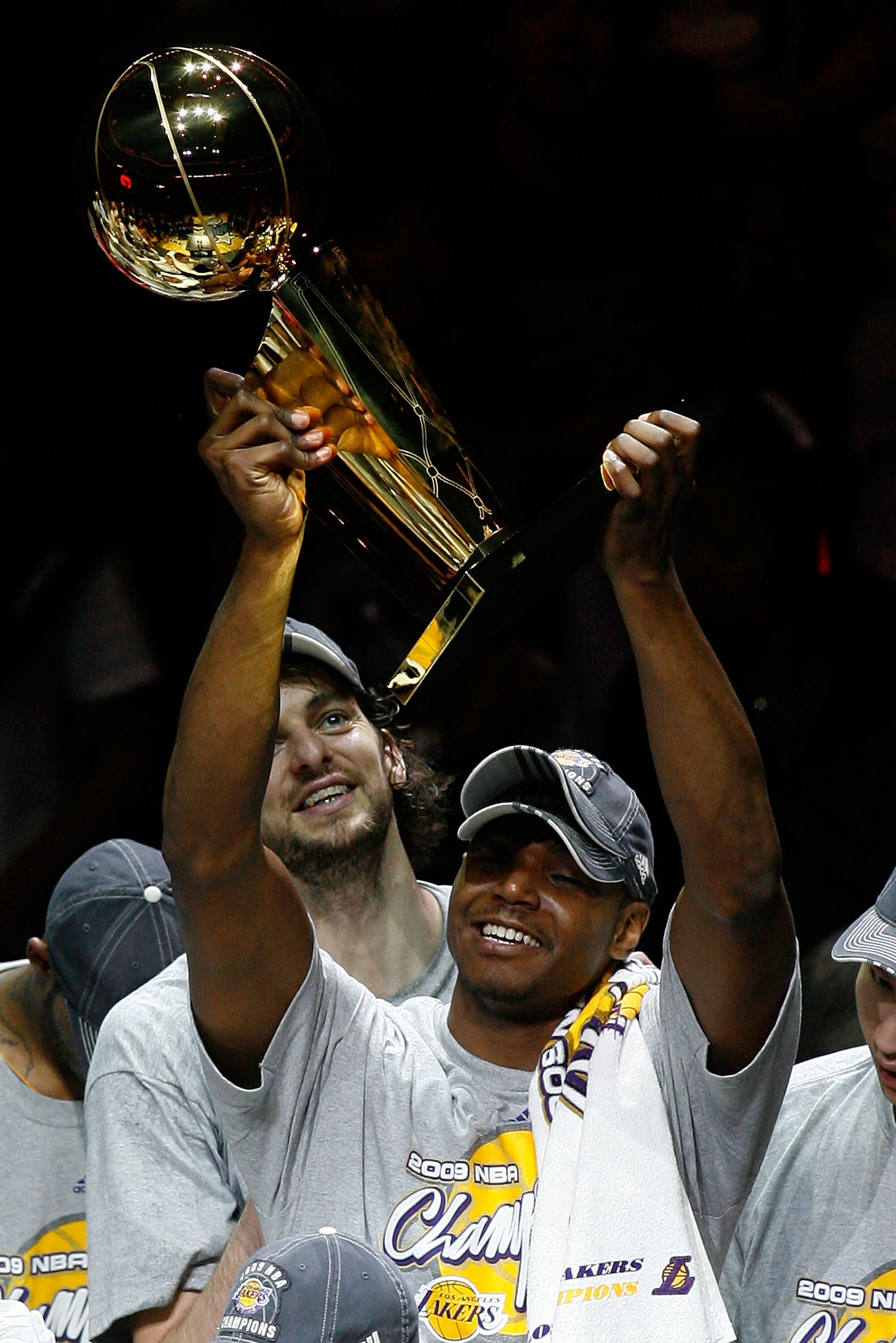 ORLANDO, FL - JUNE 14:  Andrew Bynum #17 of the Los Angeles Lakers holds up the Larry O'Brien trophy after the Lakers defeated the Orlando Magic 99-86 in Game Five of the 2009 NBA Finals on June 14, 2009 at Amway Arena in Orlando, Florida.  NOTE TO USER: