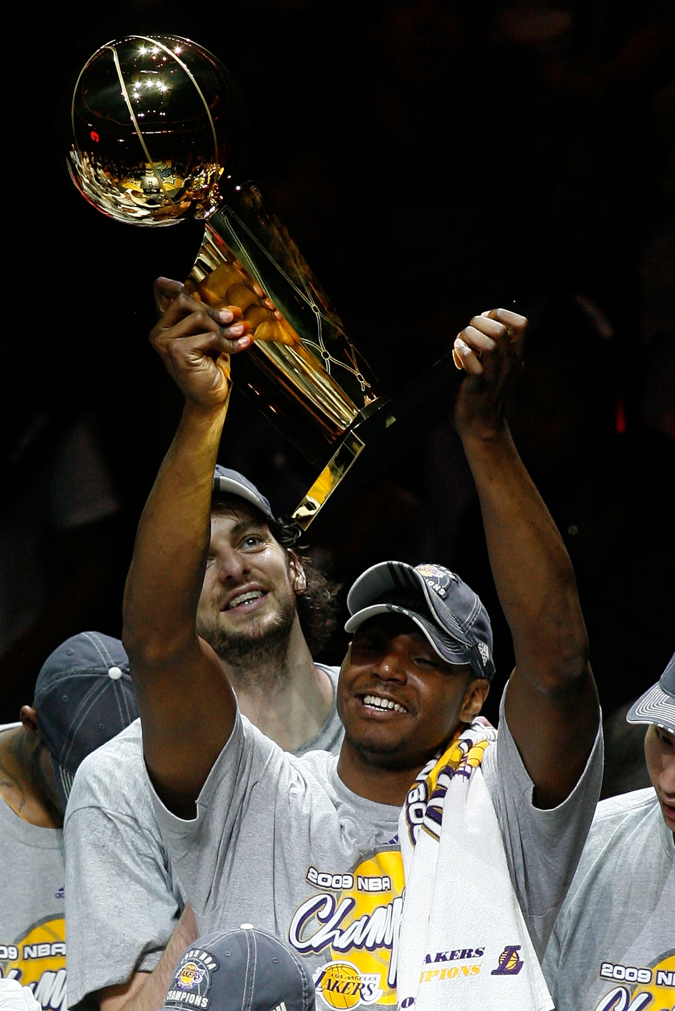 ORLANDO, FL - JUNE 14:  Andrew Bynum #17 of the Los Angeles Lakers holds up the Larry O'Brien trophy after the Lakers defeated the Orlando Magic 99-86 in Game Five of the 2009 NBA Finals on June 14, 2009 at Amway Arena in Orlando, Florida.  NOTE TO USER: