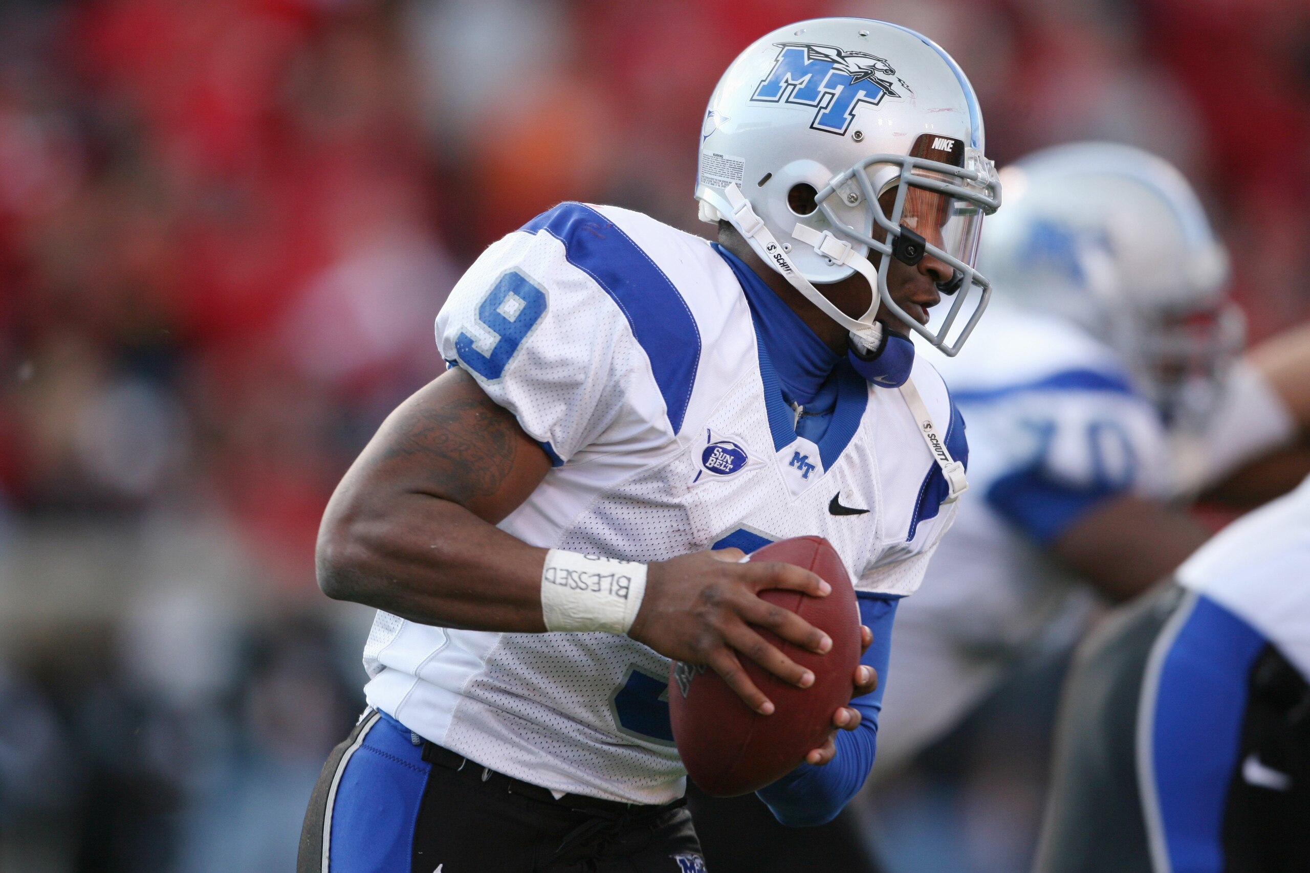 LOUISVILLE, KY - OCTOBER 18:  Quarterback Dwight Dasher #9 of the Middle Tennessee Blue Raiders looks to throw against the Louisville Cardinals during the game at Papa John's Cardinal Stadium on October 18, 2008 in Louisville, Kentucky.  Louisville defeat