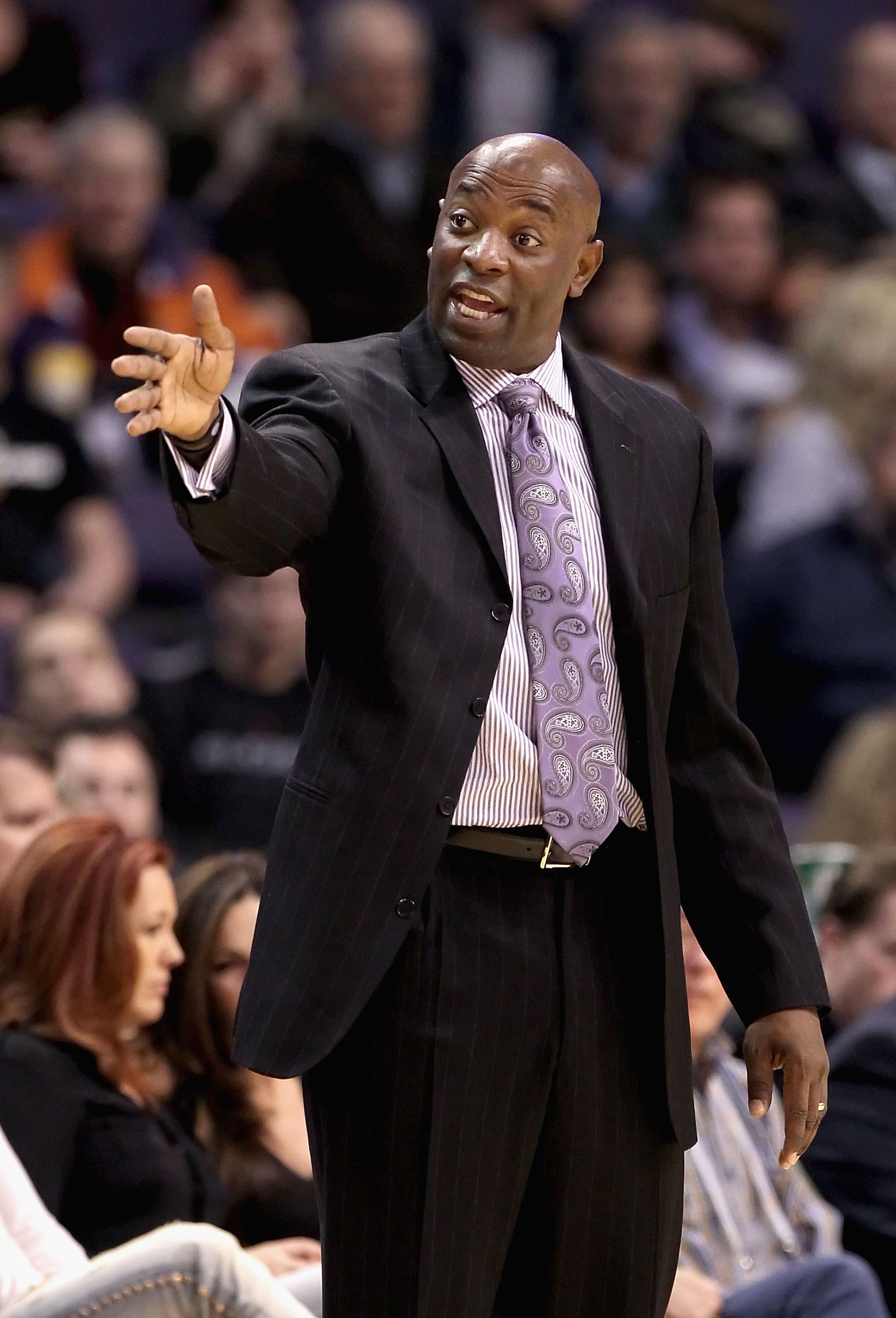 PHOENIX, AZ - FEBRUARY 10:  Head coach Keith Smart of the Golden State Warriors directs his team during the NBA game against the Phoenix Suns at US Airways Center on February 10, 2011 in Phoenix, Arizona.  The Suns defeated the Warriors 112-88. NOTE TO US