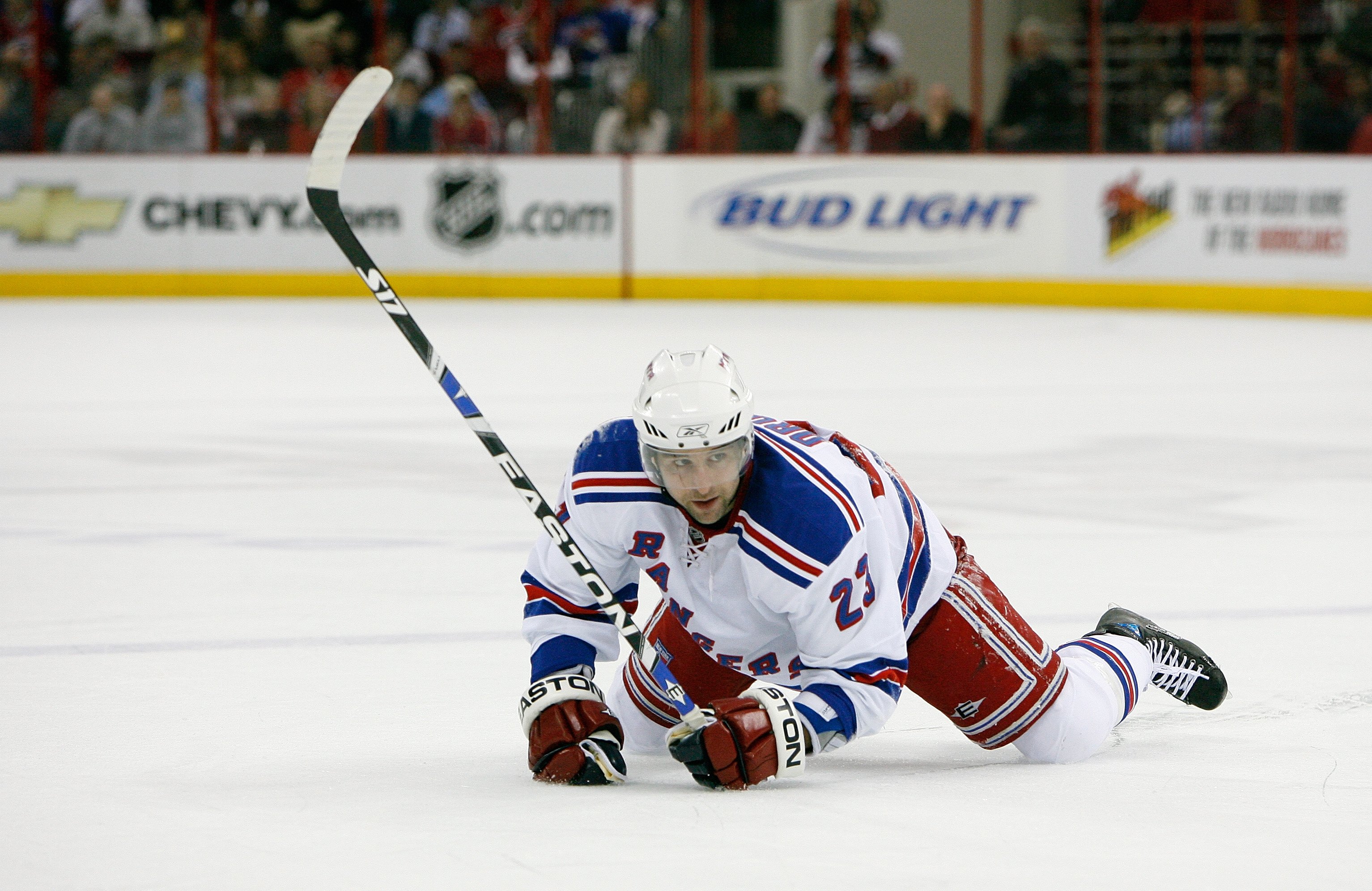 RALEIGH, NC - JANUARY 29:  Chris Drury #23 of the New York Rangers falls to his knees and elbows during NHL game action against the Carolina Hurricanes at RBC Center on January 29, 2008 in Raleigh, North Carolina. The Hurricanes defeated Rangers 3-1.  (Ph