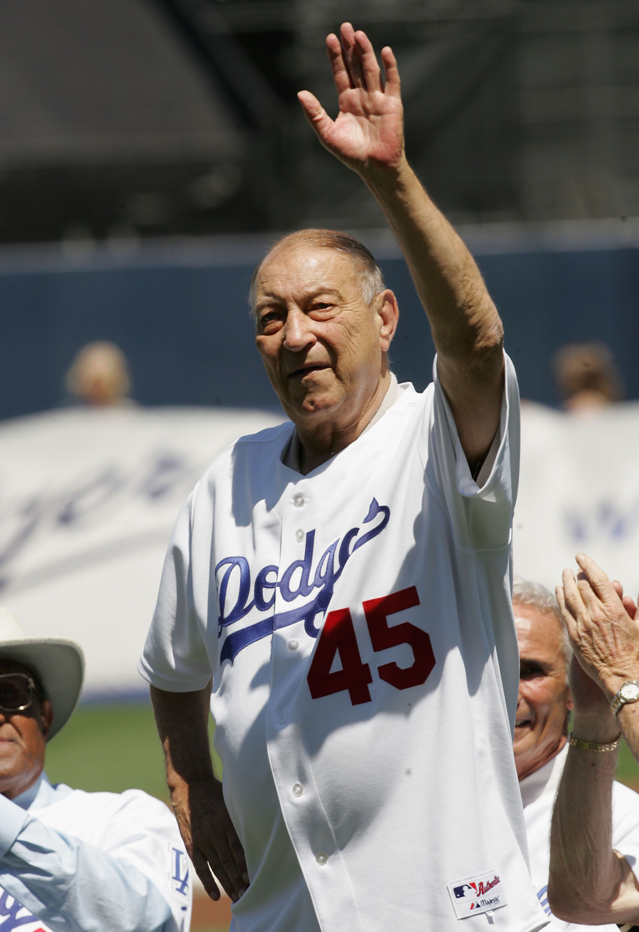 LOS ANGELES - AUGUST 28: Former Pitcher Johnny Podres of the Los Angeles Dodgers waves to the crowd during ceremonies honoring memebers of the 1955 World Champion Dodgers before the game with the Houston Astros on August 28, 2005 at Dodger Stadium in Los