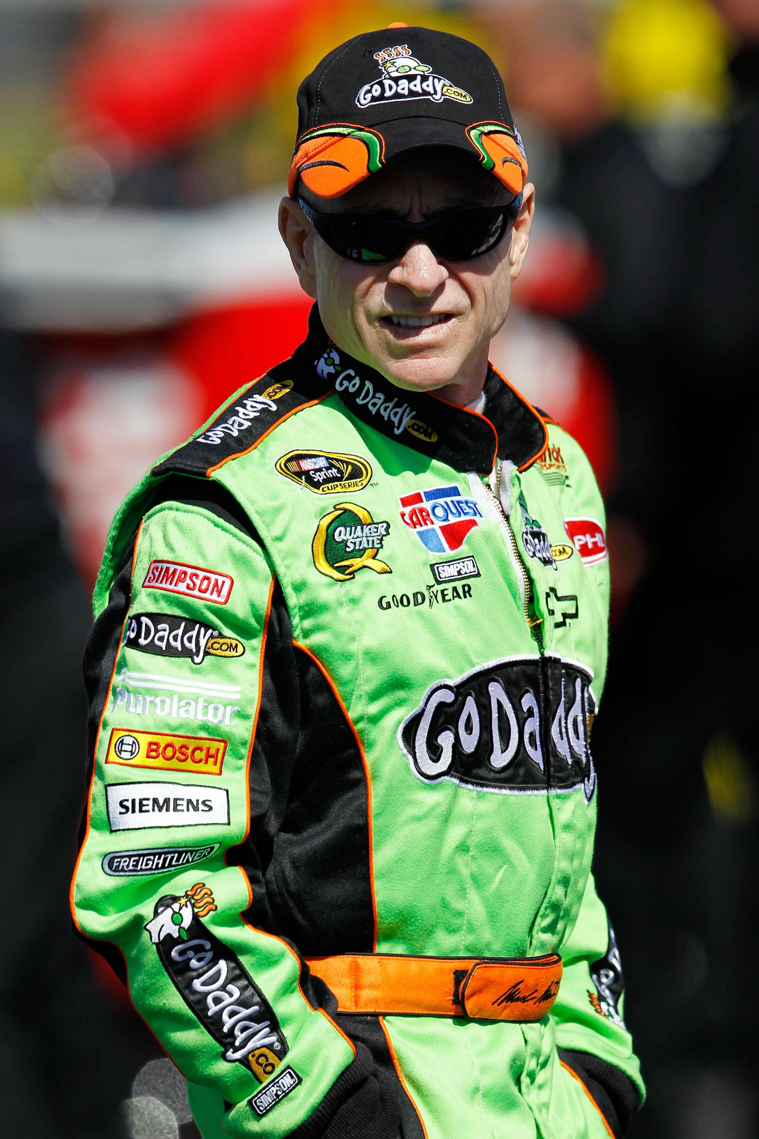 DAYTONA BEACH, FL - FEBRUARY 13:  Mark Martin, driver of the #5 GoDaddy.com Chevrolet, looks on during qualifying for the NASCAR Sprint Cup Series Daytona 500 at Daytona International Speedway on February 13, 2011 in Daytona Beach, Florida.  (Photo by Tom