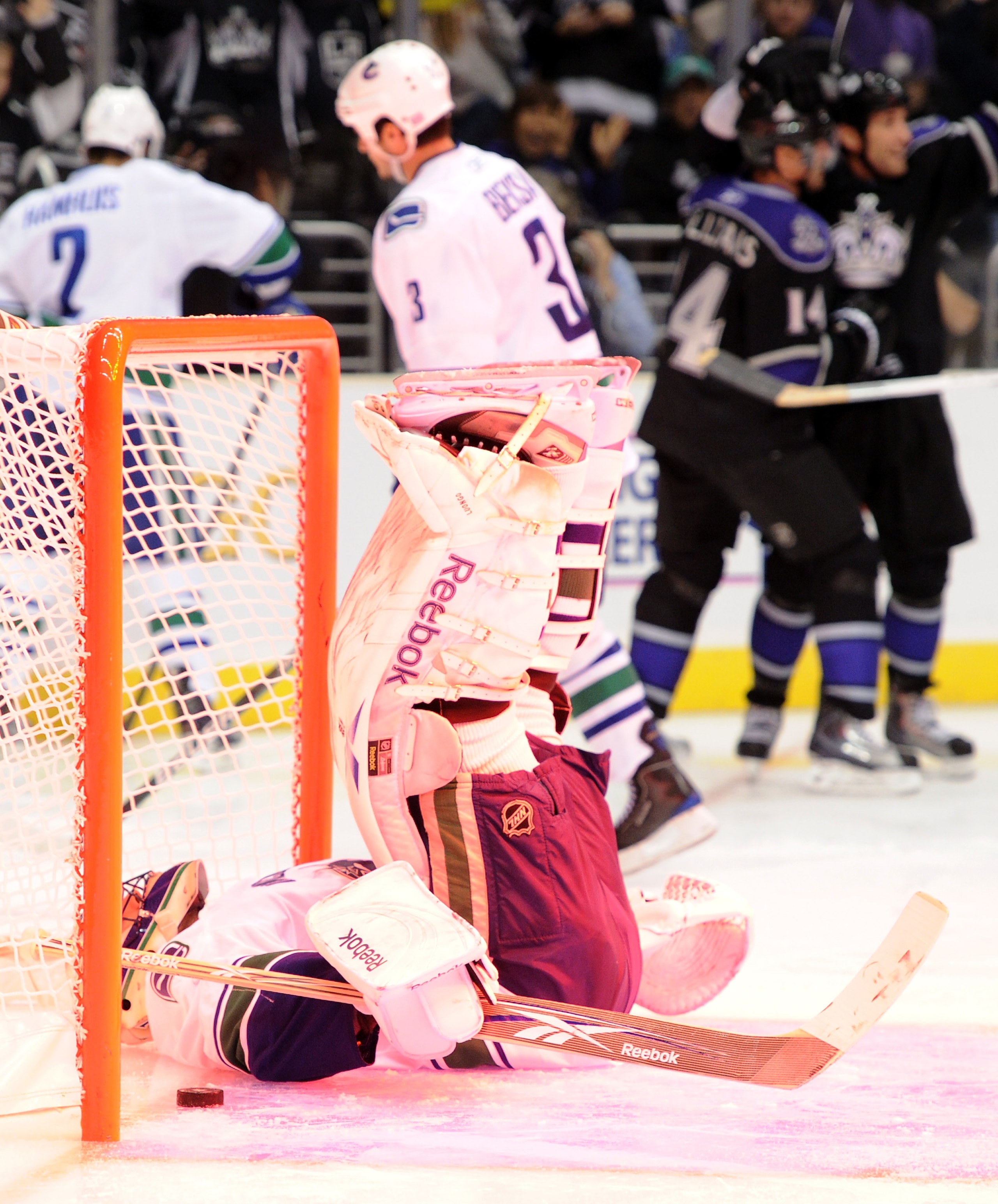 LOS ANGELES, CA - OCTOBER 15:  Roberto Luongo #1 of the Vancouver Canucks reacts after allowing the goal of Justin Williams #14 of the Los Angeles Kings for a 2-0 lead during the second period at the Staples Center on October 15, 2010 in Los Angeles, Cali