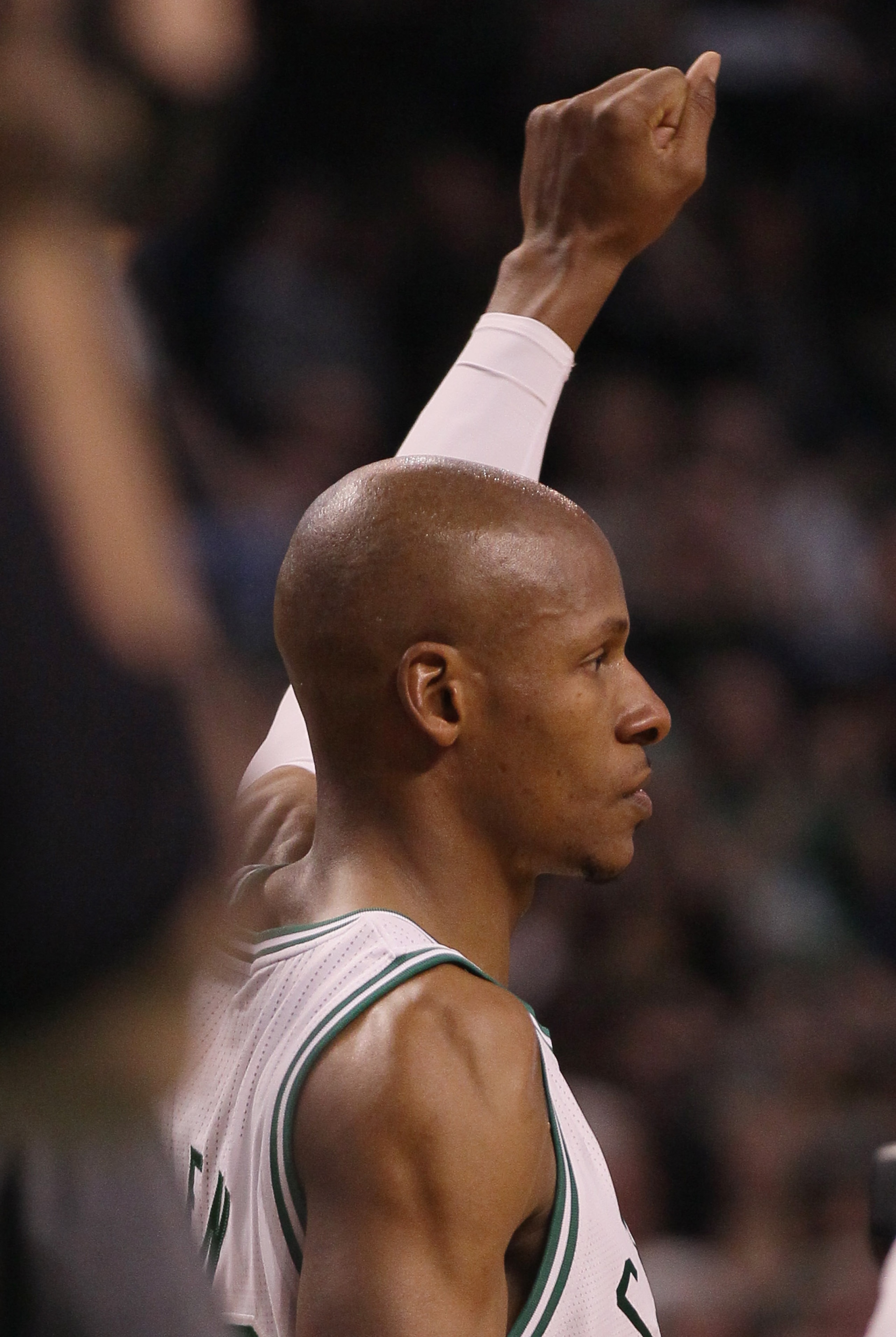 BOSTON, MA - FEBRUARY 10:  Ray Allen #20 of the Boston Celtics salutes the cheering fans after he broke the NBA 3-point record in the first half against the Los Angeles Lakers on February 10, 2011 at the TD Garden in Boston, Massachusetts.  NOTE TO USER: