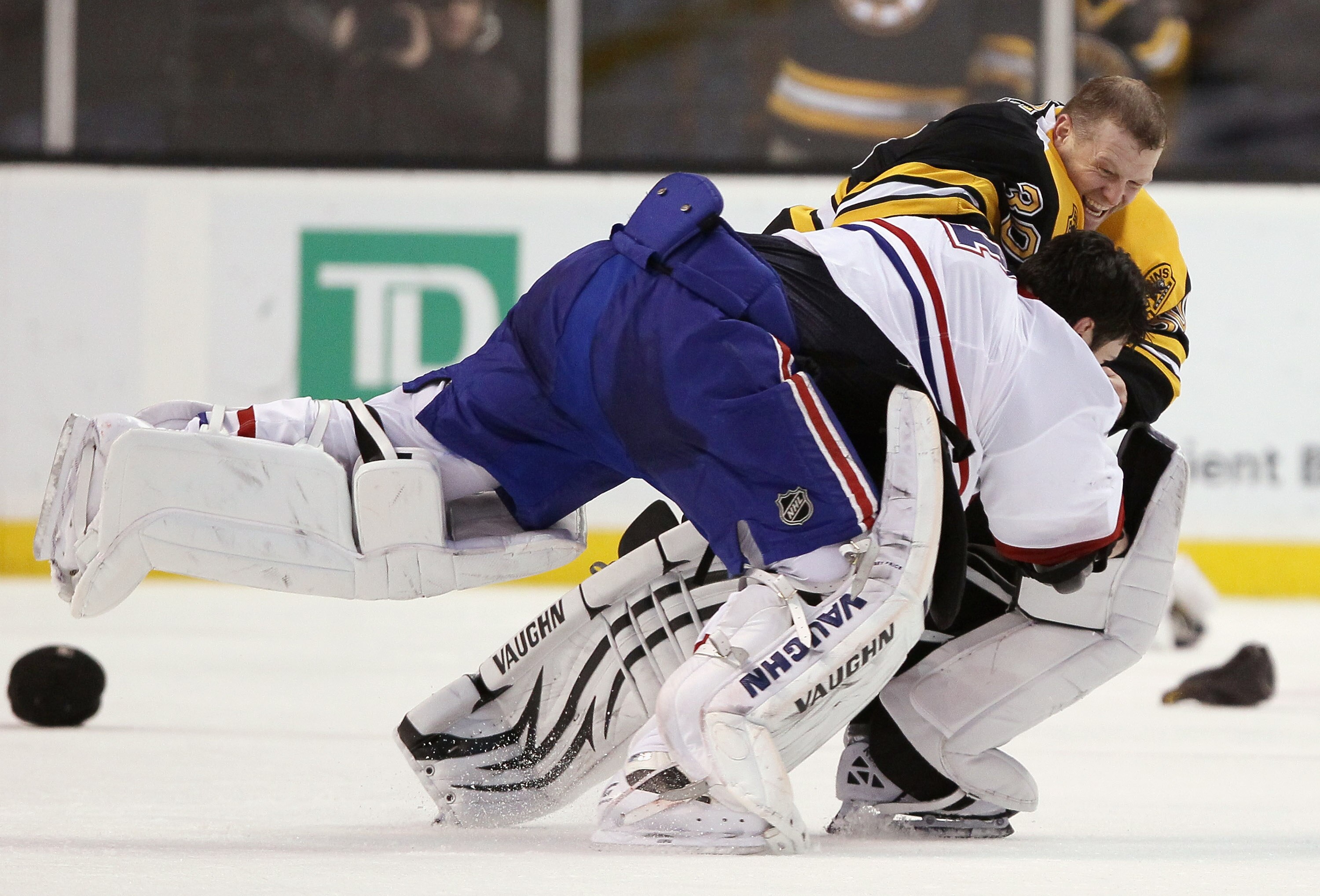 BOSTON, MA - FEBRUARY 09:  Tim Thomas #30 of the Boston Bruins and Carey Price #31 of the Montreal Canadiens fight in the second period on February 9, 2011 at the TD Garden in Boston, Massachusetts.  (Photo by Elsa/Getty Images)