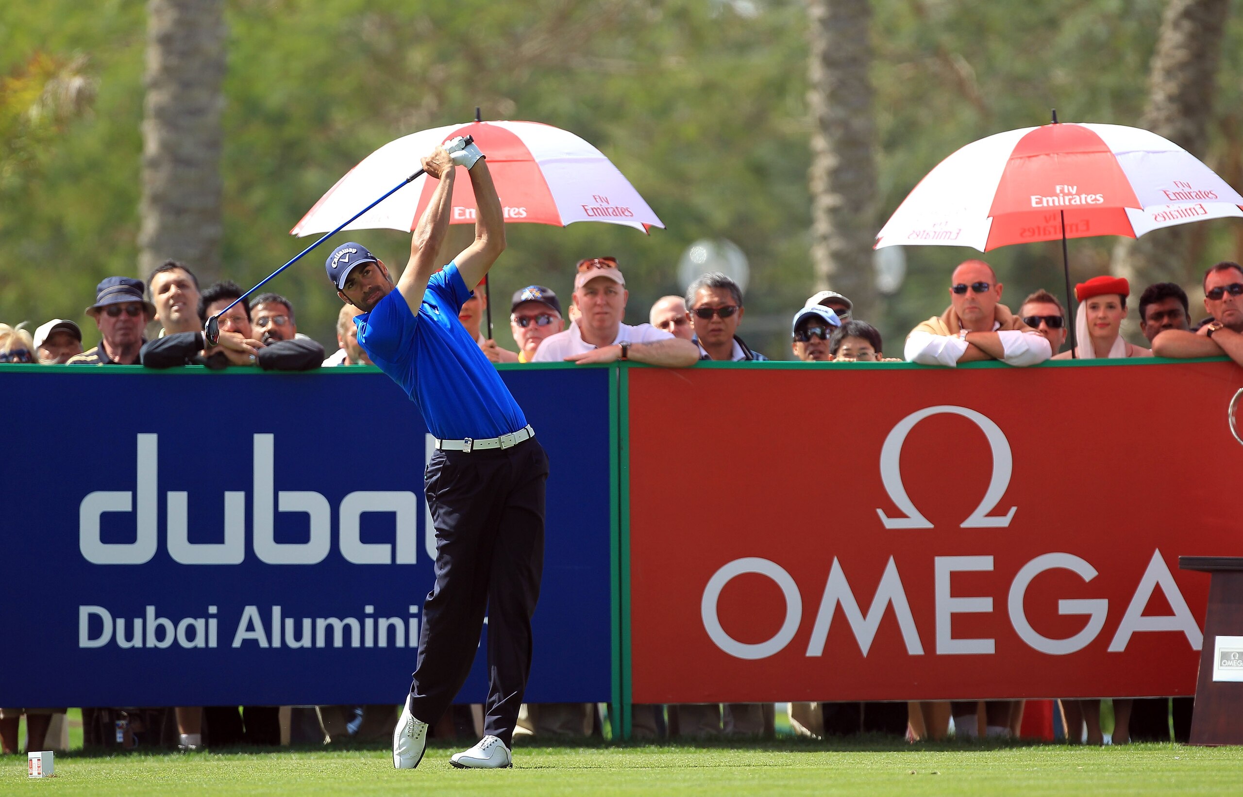 DUBAI, UNITED ARAB EMIRATES - FEBRUARY 13:  Alvaro Quiros of Spain plays his tee shot at the 1st hole during the final round of the 2011 Omega Dubai Desert Classic on the Majilis Course at the Emirates Golf Club on February 13, 2011 in Dubai, United Arab