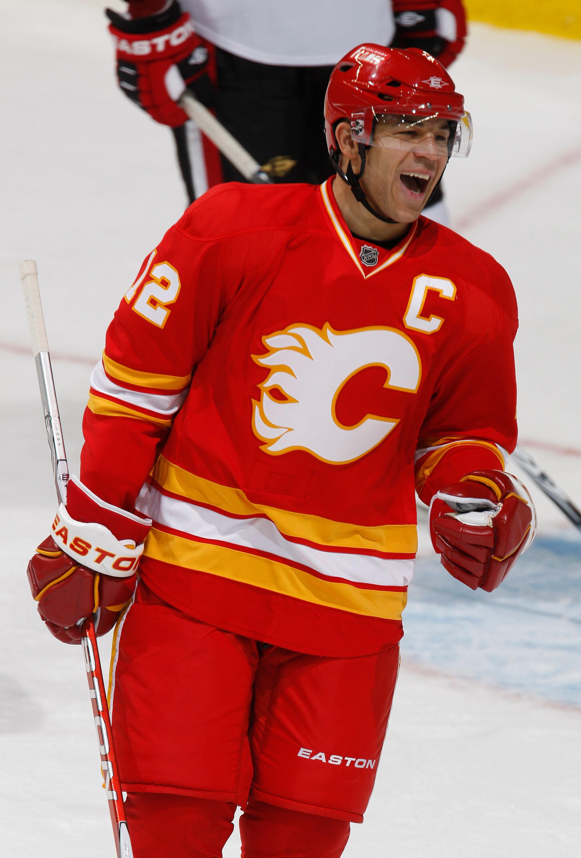 CALGARY, CANADA - FEBRUARY 9: Jarome Iginla #12 of the Calgary Flames celebrates Olli Jokinen #13 (not pictured) against the  Ottawa Senators in second period action at Scotiabank Saddledome February 9, 2011 in Calgary, Alberta, Canada. (Photo by Dale Mac