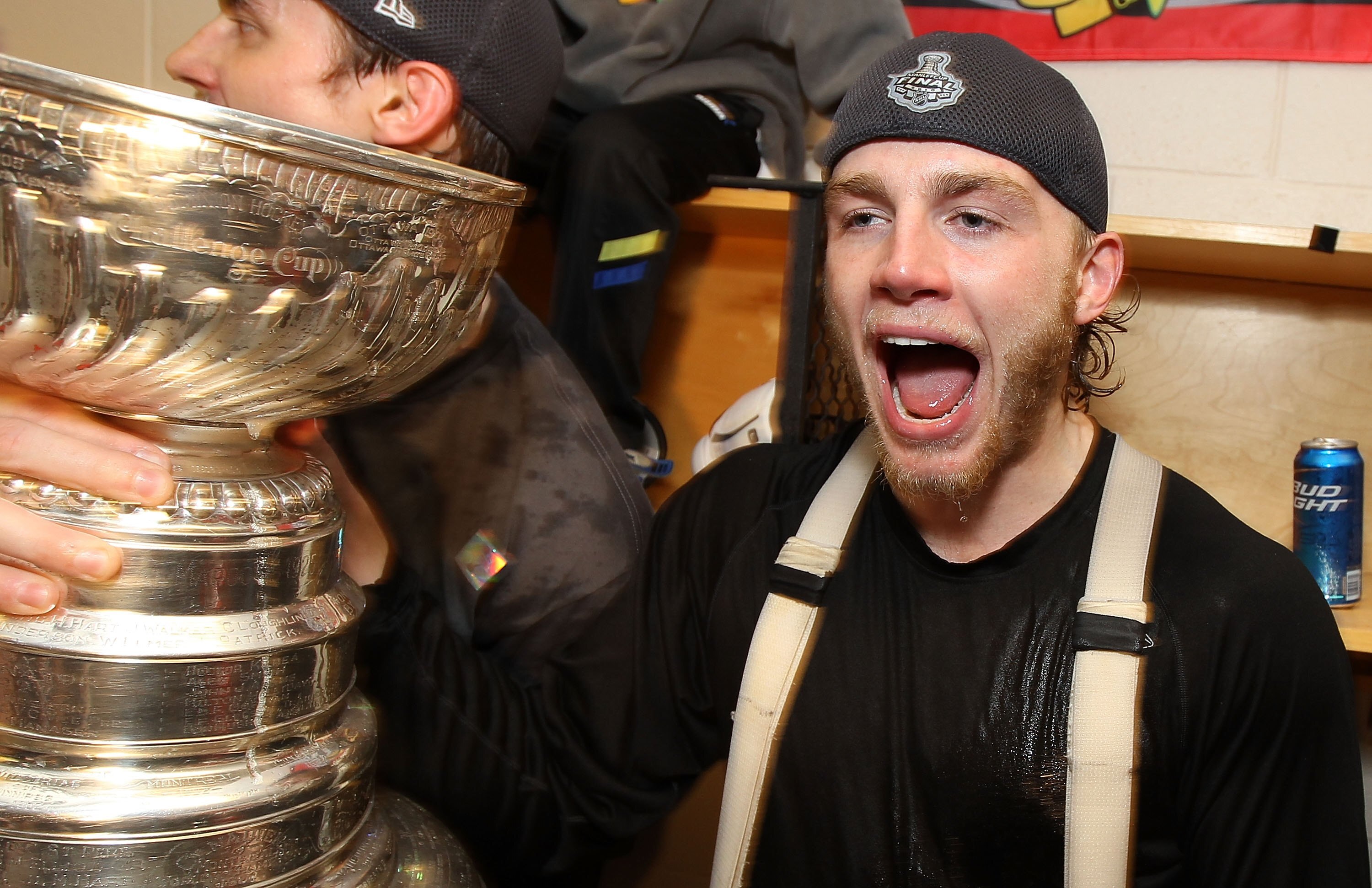 PHILADELPHIA - JUNE 09: Patrick Kane #88 of the Chicago Blackhawks celebrates with the Stanley Cup in the locker room after the Blackhawks defeated the Philadelphia Flyers 4-3 in overtime to win the Stanley Cup in Game Six of the 2010 NHL Stanley Cup Fina
