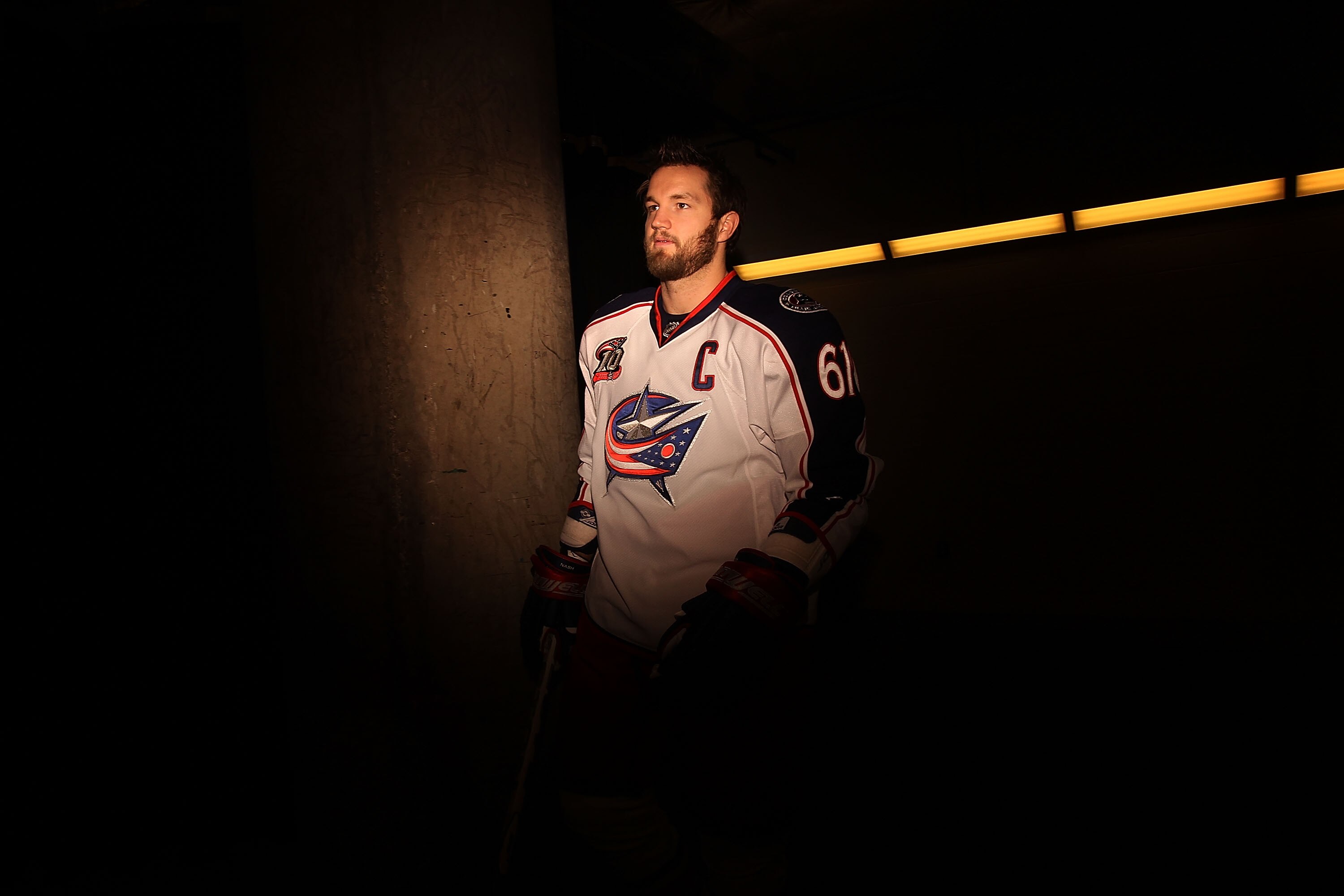 DALLAS, TX - FEBRUARY 13:  Right wing Rick Nash #61 of the Columbus Blue Jackets walks to the ice before a game against the Dallas Stars at American Airlines Center on February 13, 2011 in Dallas, Texas.  (Photo by Ronald Martinez/Getty Images)