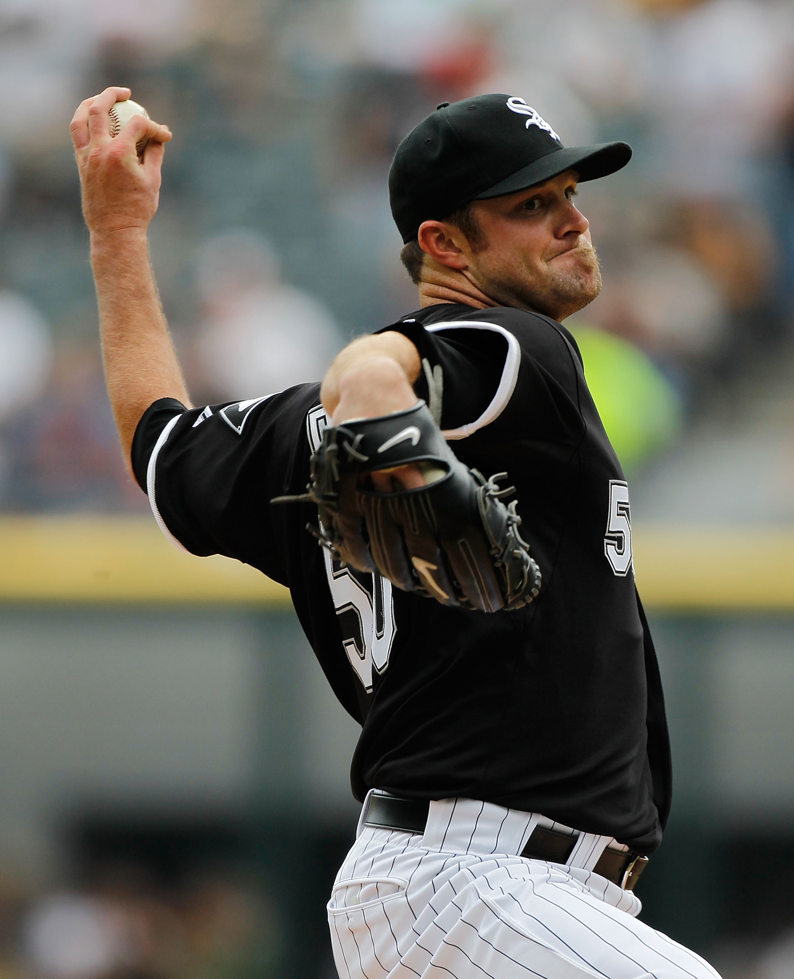 CHICAGO - JUNE 10: Starting pitcher John Danks #50 of the Chicago White Sox pitches against the Detriot Tigers at U.S. Cellular Field on June 10, 2010 in Chicago, Illinois. The White Sox defeated the Tigers 3-0. (Photo by Jonathan Daniel/Getty Images)
