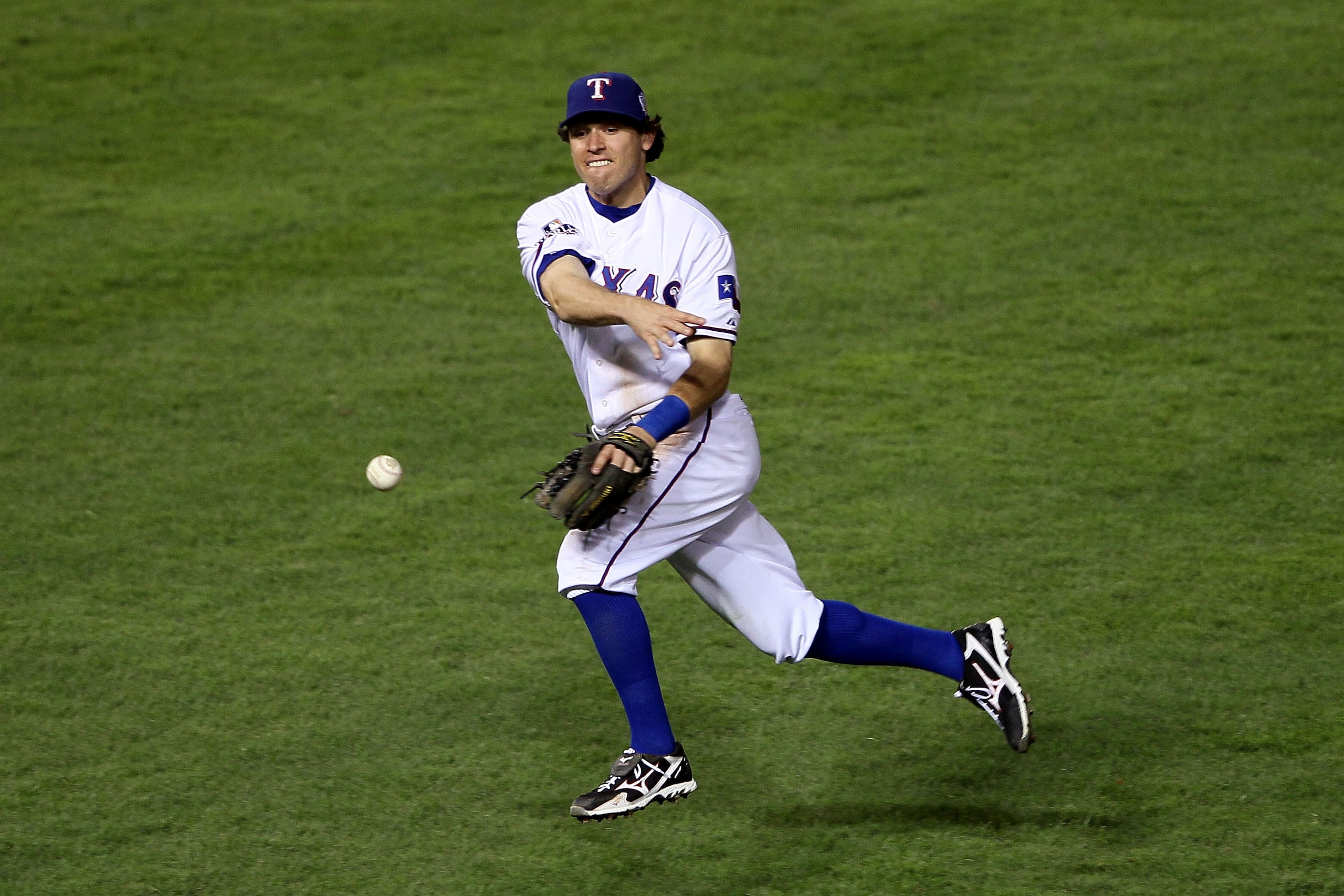 ARLINGTON, TX - NOVEMBER 01: Ian Kinsler #5 of the Texas Rangers throws the ball to first base against the San Francisco Giants in Game Five of the 2010 MLB World Series at Rangers Ballpark in Arlington on November 1, 2010 in Arlington, Texas. (Photo by ARLINGTON, TX - NOVEMBER 01: Ian Kinsler #5 of the Texas Rangers throws the ball to first base against the San Francisco Giants in Game Five of the 2010 MLB World Series at Rangers Ballpark in Arlington on November 1, 2010 in Arlington, Texas. (Photo by