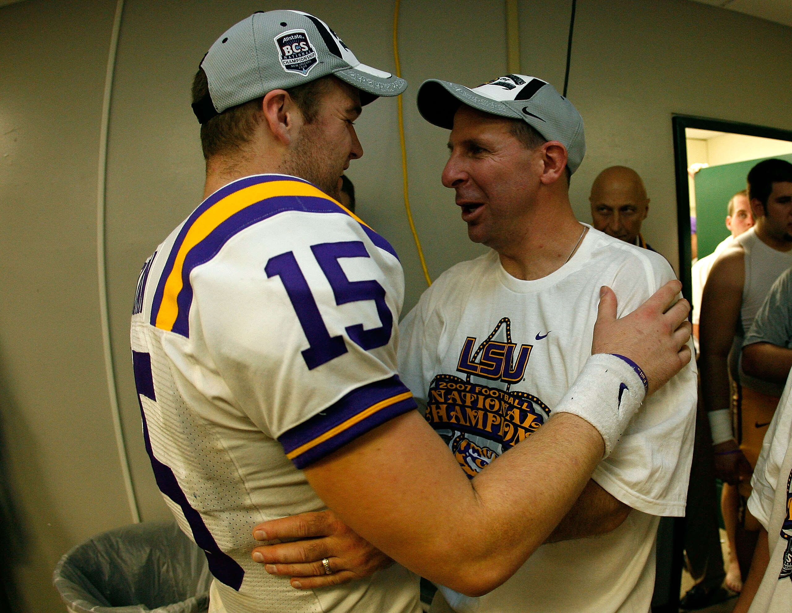 NEW ORLEANS - JANUARY 07:  Quarterback Matt Flynn #15 of the Louisiana State University Tigers celebrates with coach Bo Pelini after defeating the Ohio State Buckeyes 38-24 in the AllState BCS National Championship on January 7, 2008 at the Louisiana Supe