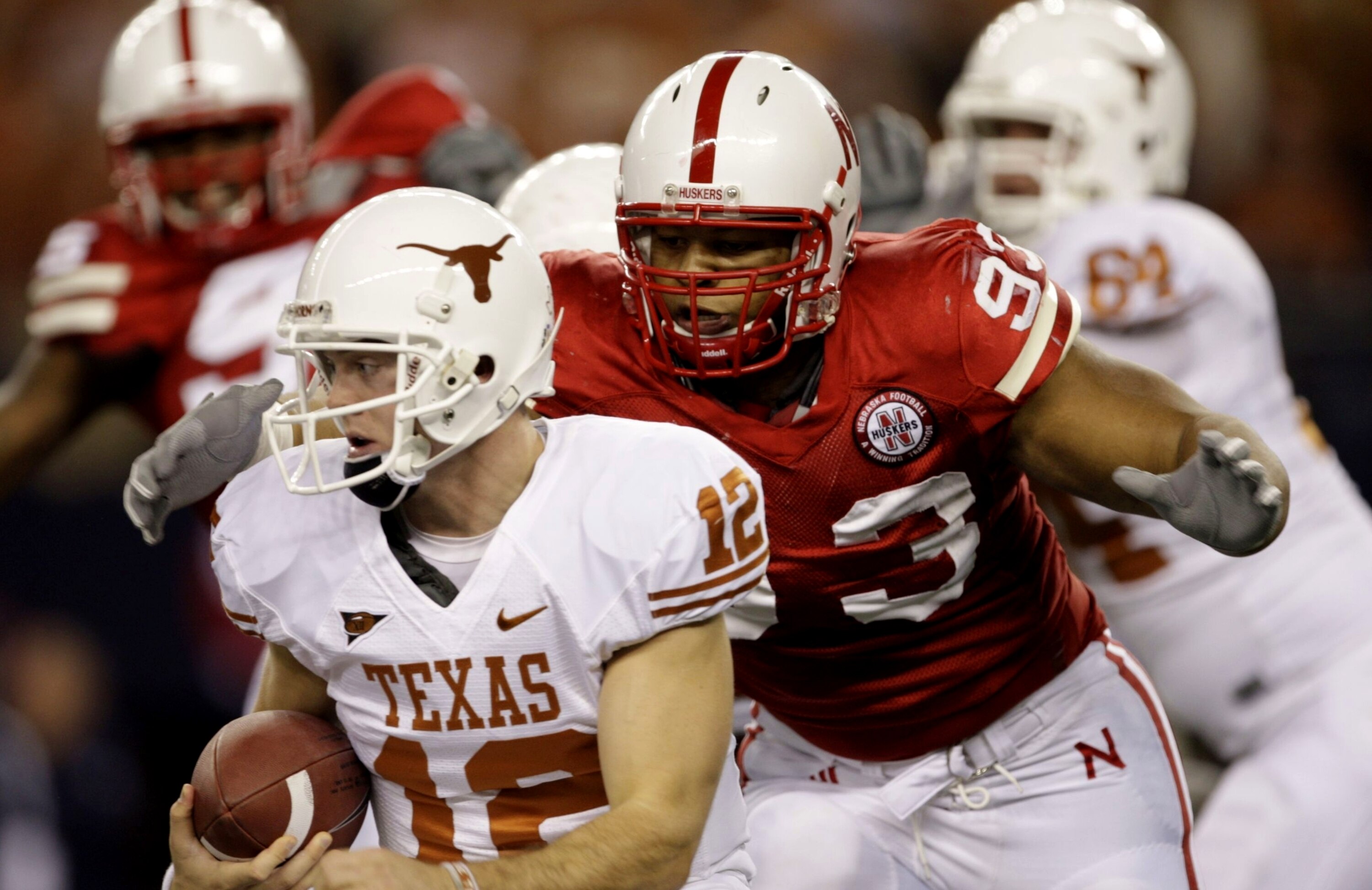 ARLINGTON, TX - DECEMBER 5:  Quarterback Colt McCoy #12 of the Texas Longhorns is sacked by Ndamukong Suh #93 of the Nebraska Cornhuskers in the first quarter of the game at Cowboys Stadium on December 5, 2009 in Arlington, Texas. (Photo by Jamie Squire/G
