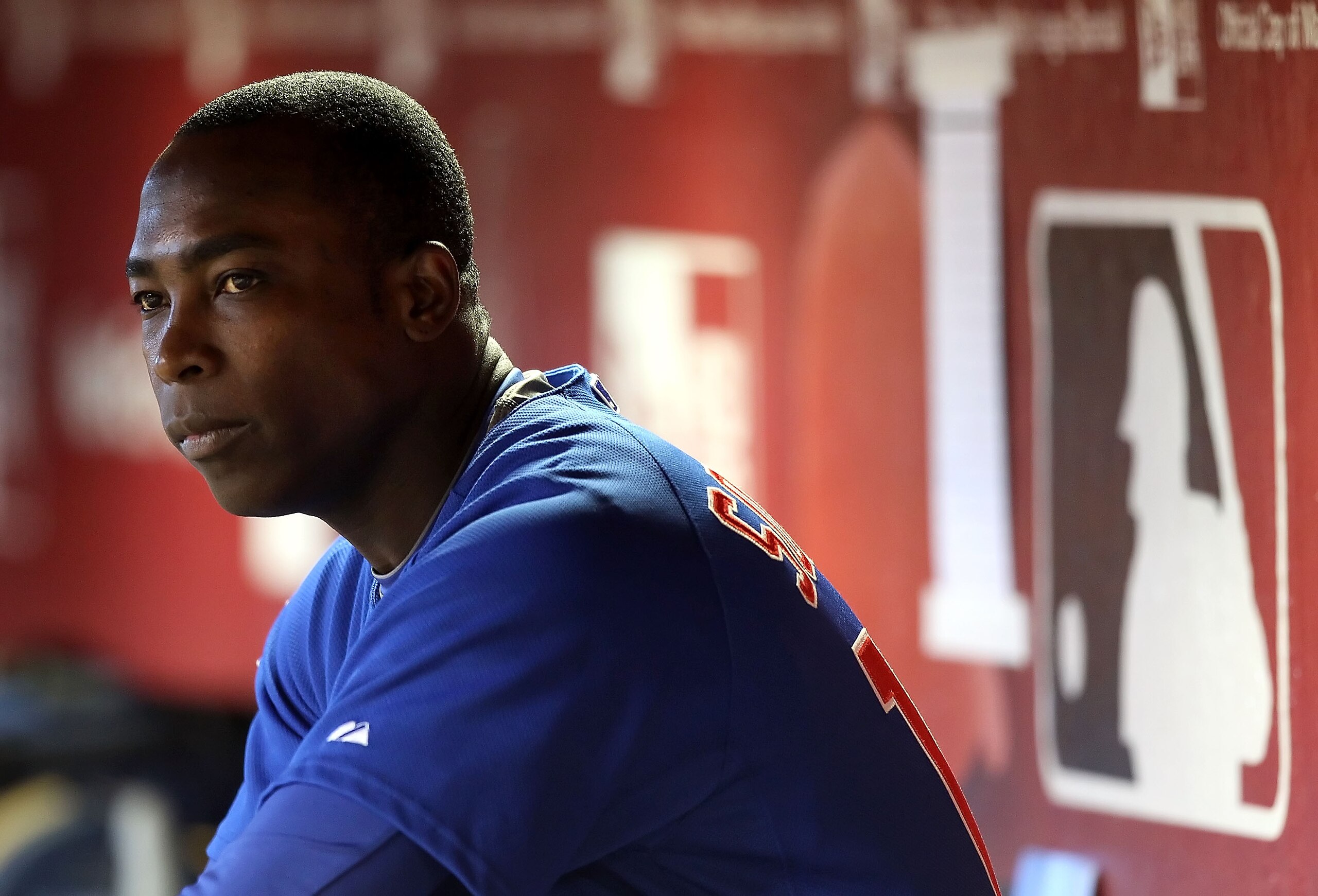 PHOENIX - JULY 05:  Alfonso Soriano #12 of the Chicago Cubs sits in the dugout during the Major League Baseball game against the Arizona Diamondbacks at Chase Field on July 5, 2010 in Phoenix, Arizona.  (Photo by Christian Petersen/Getty Images)