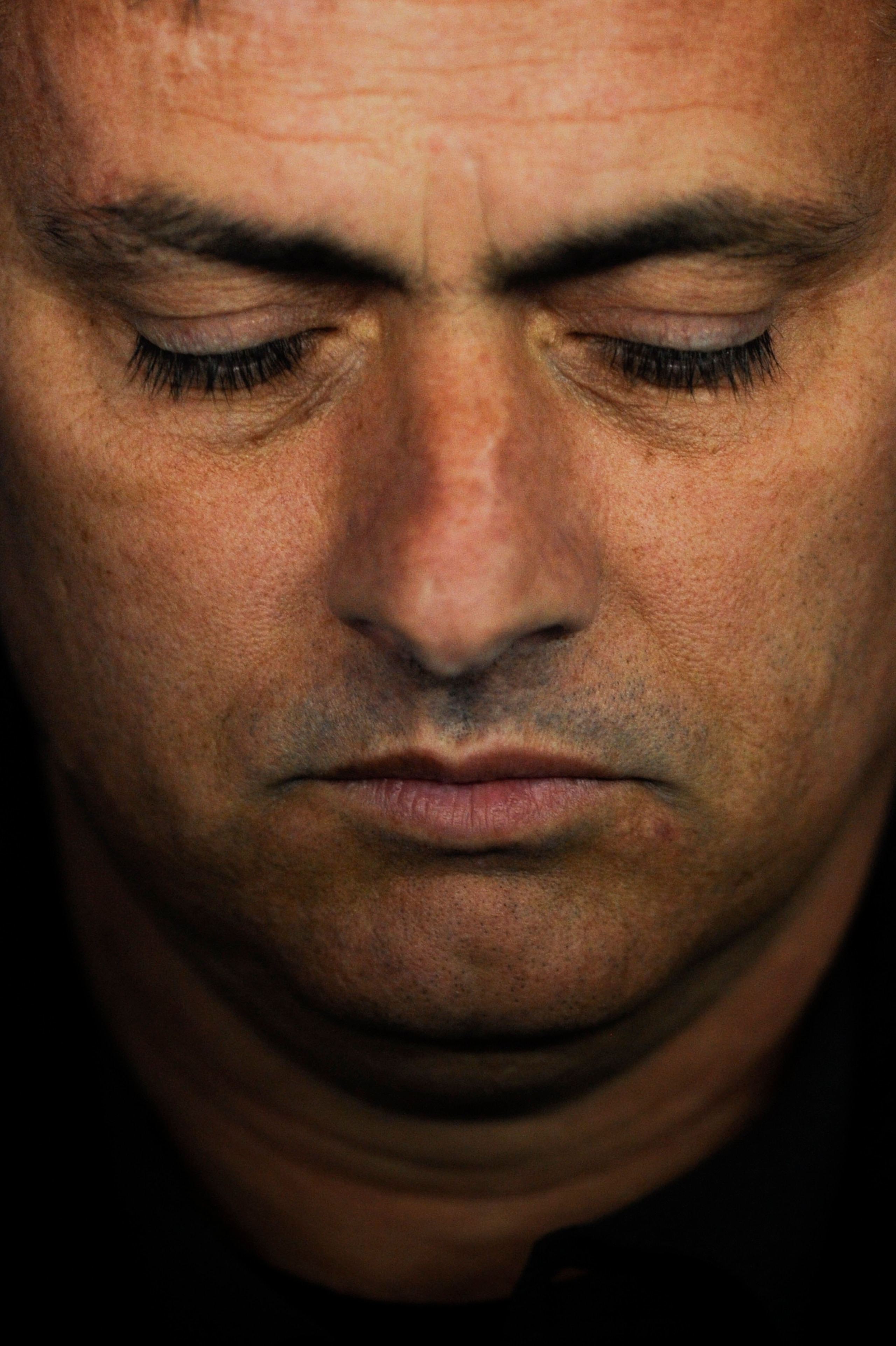 BARCELONA, SPAIN - FEBRUARY 13:  Jose Mourinho of Real Madrid looks down prior La Liga match between RCD Espanyol and Real Madrid at Estadi Cornella-El Prat on February 13, 2011 in Barcelona, Spain. Real Madrid won 0-1.  (Photo by David Ramos/Getty Images