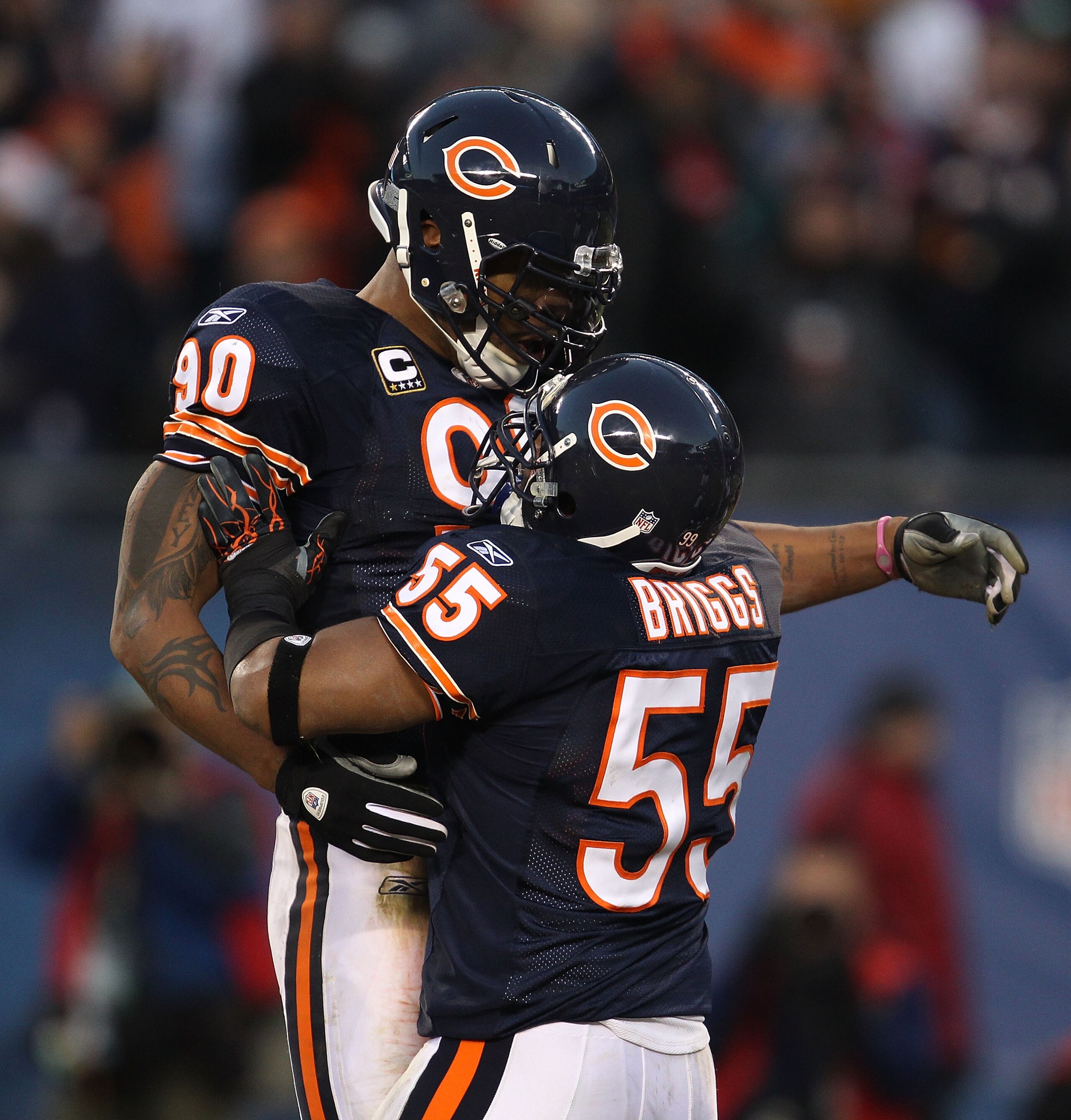 CHICAGO - NOVEMBER 28: Lance Briggs #55 of the Chicago Bears celebrates a sack by Julius Peppers #90 against the Philadelphia Eagles at Soldier Field on November 28, 2010 in Chicago, Illinois. (Photo by Jonathan Daniel/Getty Images) CHICAGO - NOVEMBER 28: Lance Briggs #55 of the Chicago Bears celebrates a sack by Julius Peppers #90 against the Philadelphia Eagles at Soldier Field on November 28, 2010 in Chicago, Illinois. (Photo by Jonathan Daniel/Getty Images)