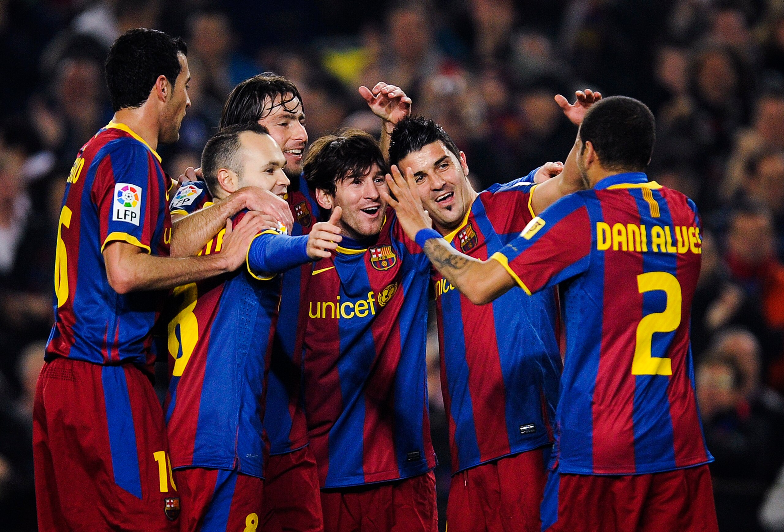 BARCELONA, SPAIN - FEBRUARY 05:  Lionel Messi of Barcelona (3rdR) celebrates with his teammates after scoring his first team's goal during the La Liga match between Barcelona and Atletico de Madrid at Camp Nou on February 5, 2011 in Barcelona, Spain.  (Ph