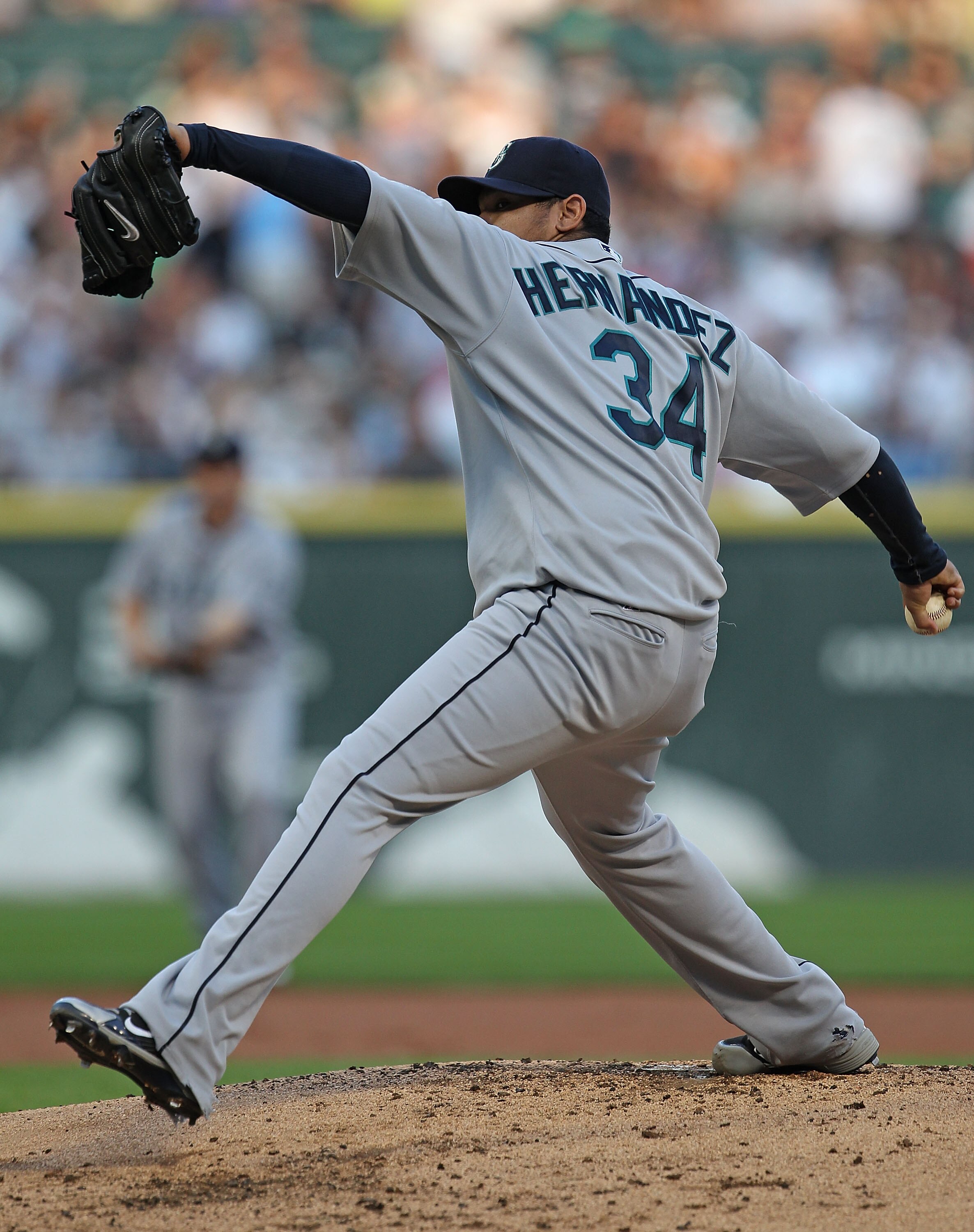 CHICAGO - JULY 26: Starting pitcher Felix Hernandez #34 of the Seattle Mariners delivers the ball against the Chicago White Sox at U.S. Cellular Field on July 26, 2010 in Chicago, Illinois. The White Sox defeated the Mariners 6-1. (Photo by Jonathan Danie
