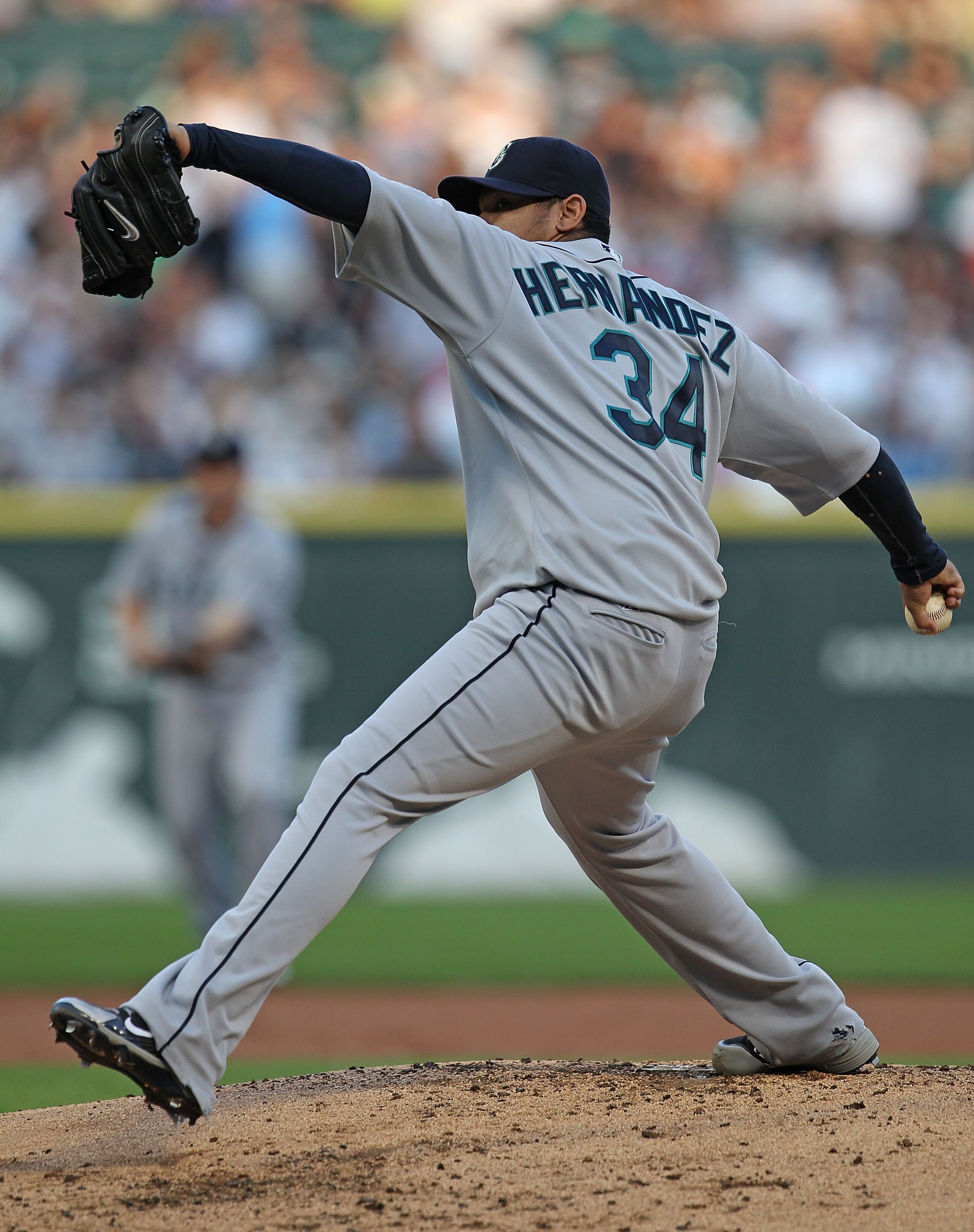 CHICAGO - JULY 26: Starting pitcher Felix Hernandez #34 of the Seattle Mariners delivers the ball against the Chicago White Sox at U.S. Cellular Field on July 26, 2010 in Chicago, Illinois. The White Sox defeated the Mariners 6-1. (Photo by Jonathan Danie