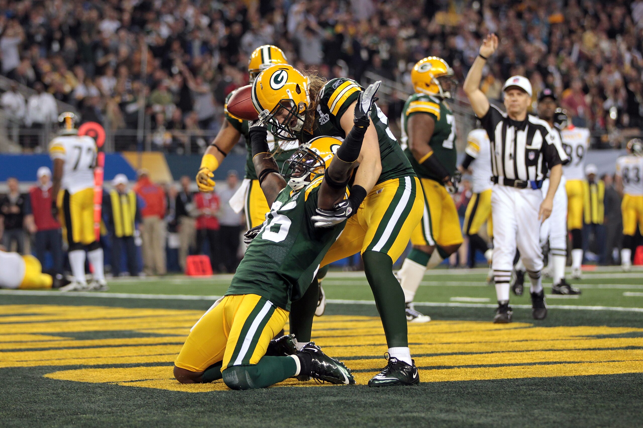 ARLINGTON, TX - FEBRUARY 06: Nick Collins #36 of the Green Bay Packers celebrates with Clay Matthews #52 after catching an interception for a touchdown against the Pittsburgh Steelers during Super Bowl XLV at Cowboys Stadium on February 6, 2011 in Arling ARLINGTON, TX - FEBRUARY 06: Nick Collins #36 of the Green Bay Packers celebrates with Clay Matthews #52 after catching an interception for a touchdown against the Pittsburgh Steelers during Super Bowl XLV at Cowboys Stadium on February 6, 2011 in Arling