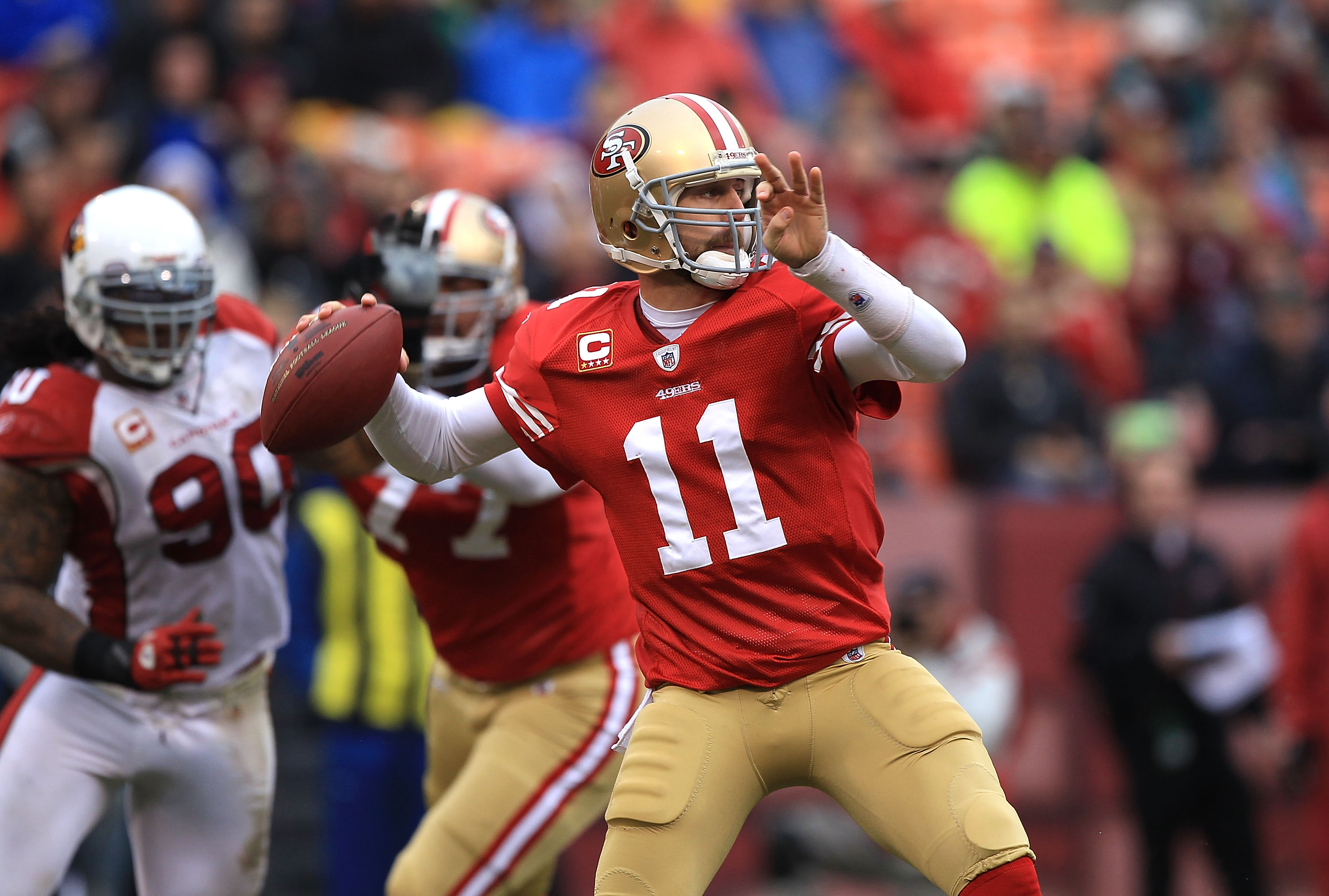 SAN FRANCISCO, CA - JANUARY 2: Alex Smith #11 of the San Francisco 49ers passes against the Arizona Cardinals during an NFL game at Candlestick Park on January 2, 2011 in San Francisco, California.(Photo by Jed Jacobsohn/Getty Images)