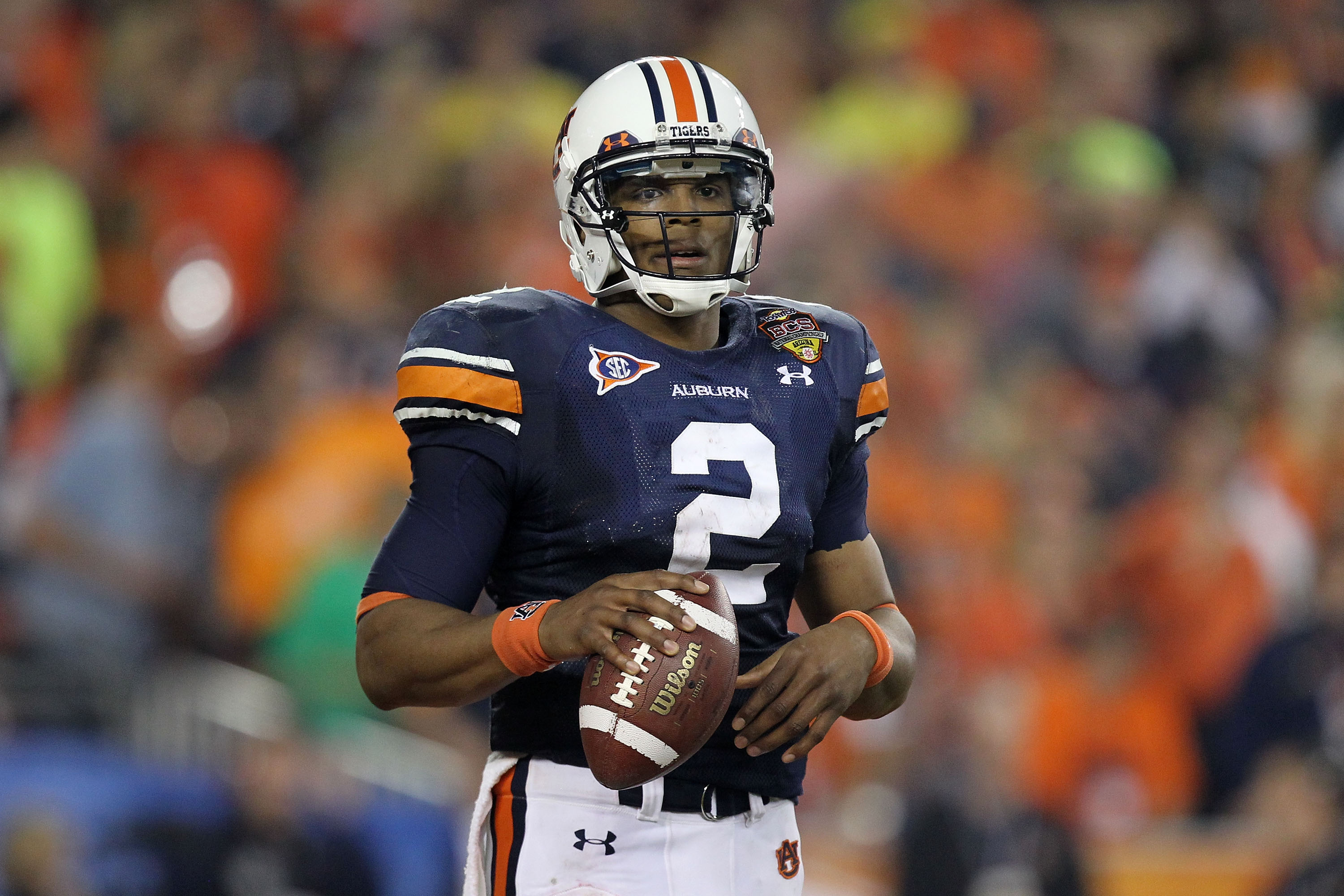 GLENDALE, AZ - JANUARY 10: Cameron Newton #2 of the Auburn Tigers looks on against the Oregon Ducks during the Tostitos BCS National Championship Game at University of Phoenix Stadium on January 10, 2011 in Glendale, Arizona. (Photo by Ronald Martinez/G