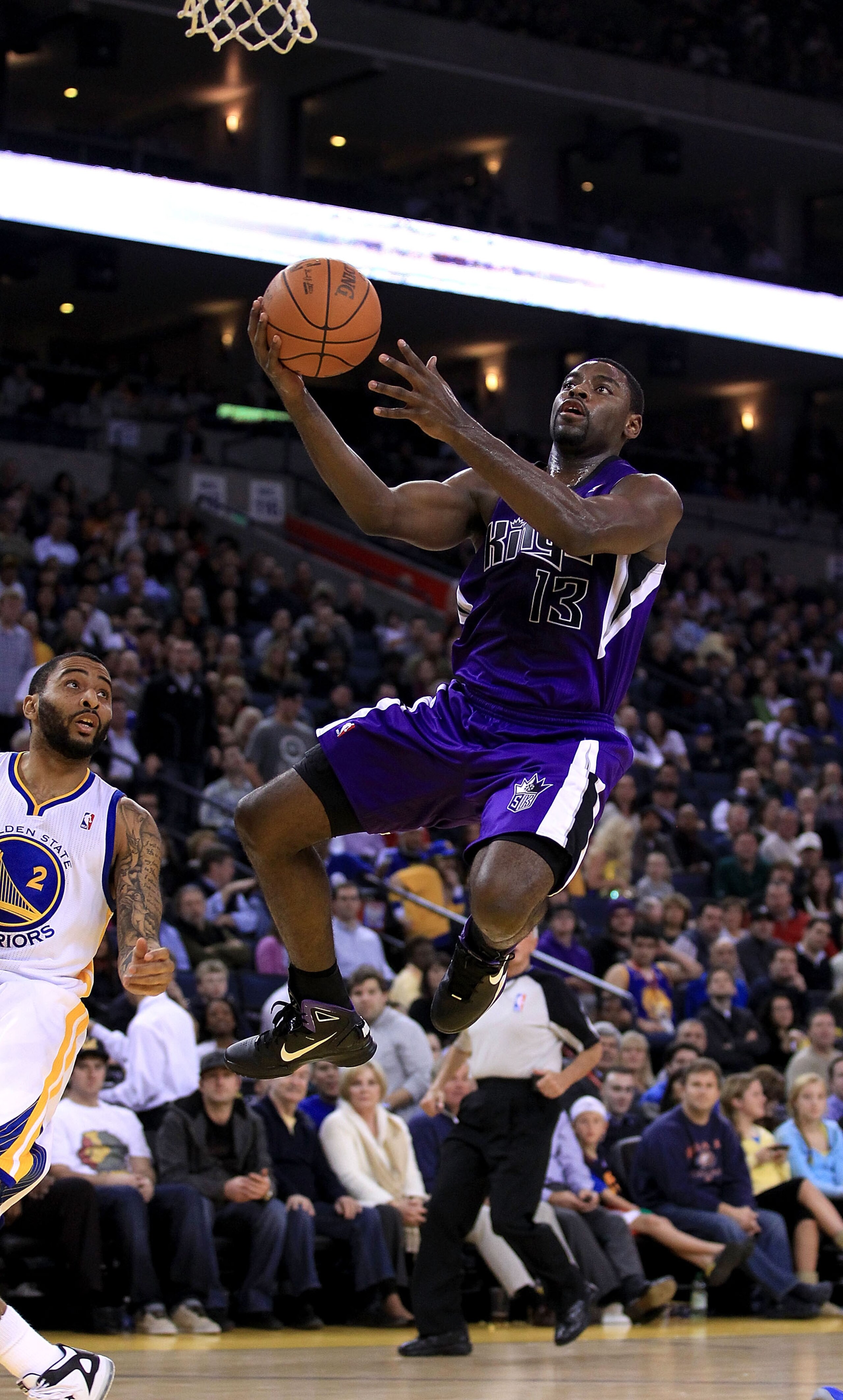OAKLAND, CA - JANUARY 21: Tyreke Evans #13 of the Sacramento Kings goes up for a shot against the Golden State Warriors at Oracle Arena on January 21, 2011 in Oakland, California. NOTE TO USER: User expressly acknowledges and agrees that, by downloading OAKLAND, CA - JANUARY 21: Tyreke Evans #13 of the Sacramento Kings goes up for a shot against the Golden State Warriors at Oracle Arena on January 21, 2011 in Oakland, California. NOTE TO USER: User expressly acknowledges and agrees that, by downloading