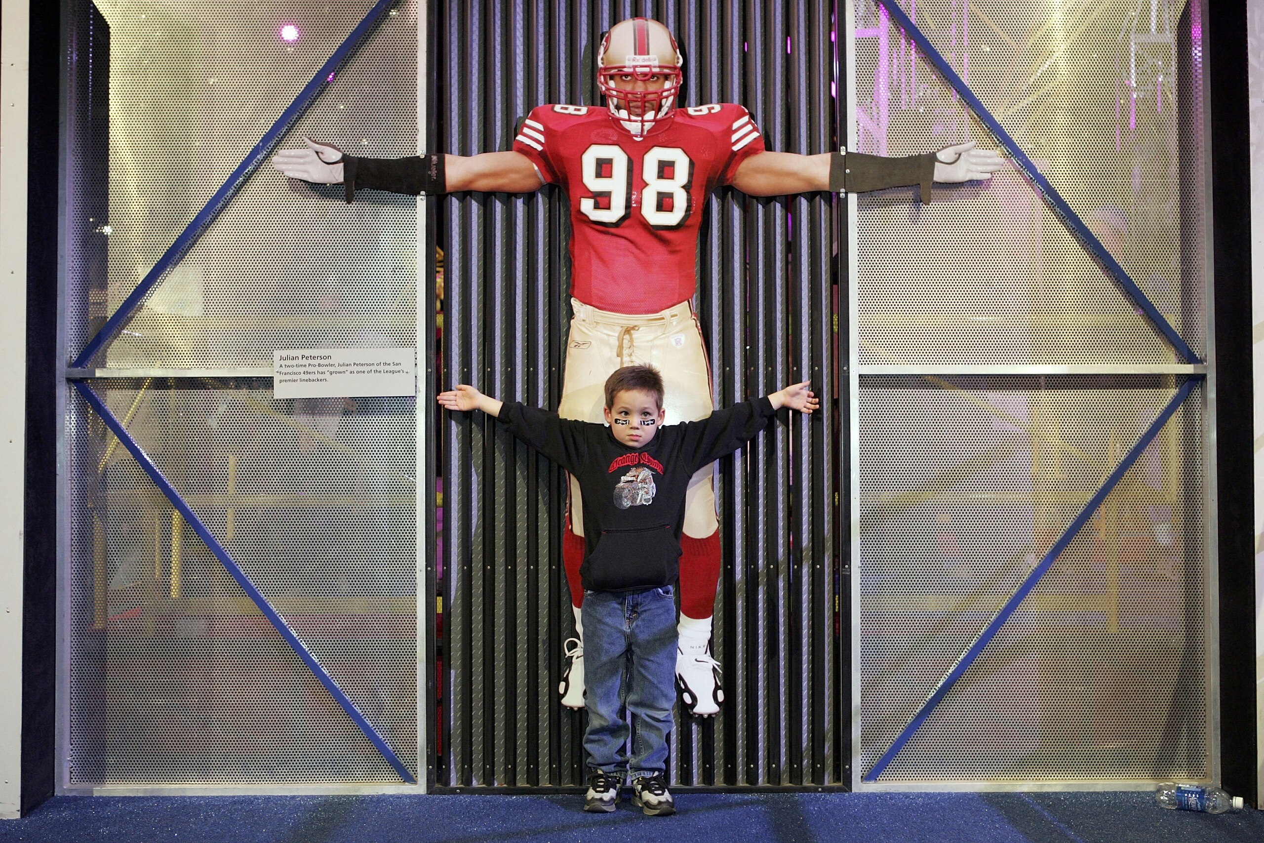 DETROIT - FEBRUARY 3: Dawson Morrison of Ann Arbor, Michigan, compares his wingspan with that of an NFL player's at the NFL Experience on Feburary 3, 2006 at the Cobo Center in Detroit, Michigan. (Photo by Andy Lyons/Getty Images) DETROIT - FEBRUARY 3: Dawson Morrison of Ann Arbor, Michigan, compares his wingspan with that of an NFL player's at the NFL Experience on Feburary 3, 2006 at the Cobo Center in Detroit, Michigan. (Photo by Andy Lyons/Getty Images)