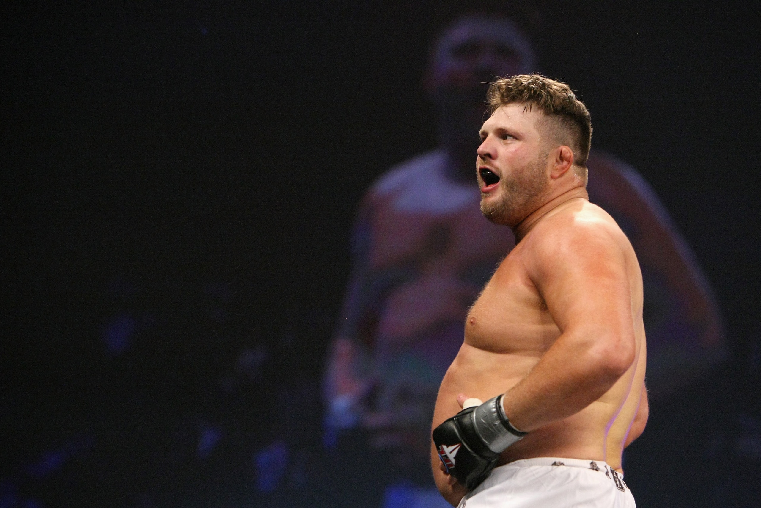 UNCASVILLE, CT - MAY 16: Roy Nelson (White Trunks) of the Lions Den celebrates after beating Brad Imes MilesTech Fighting System during their bout presented by the International Fighting League at the Mohegan Sun Arena May 16, 2008 in Uncasville, Connecti UNCASVILLE, CT - MAY 16: Roy Nelson (White Trunks) of the Lions Den celebrates after beating Brad Imes MilesTech Fighting System during their bout presented by the International Fighting League at the Mohegan Sun Arena May 16, 2008 in Uncasville, Connecti