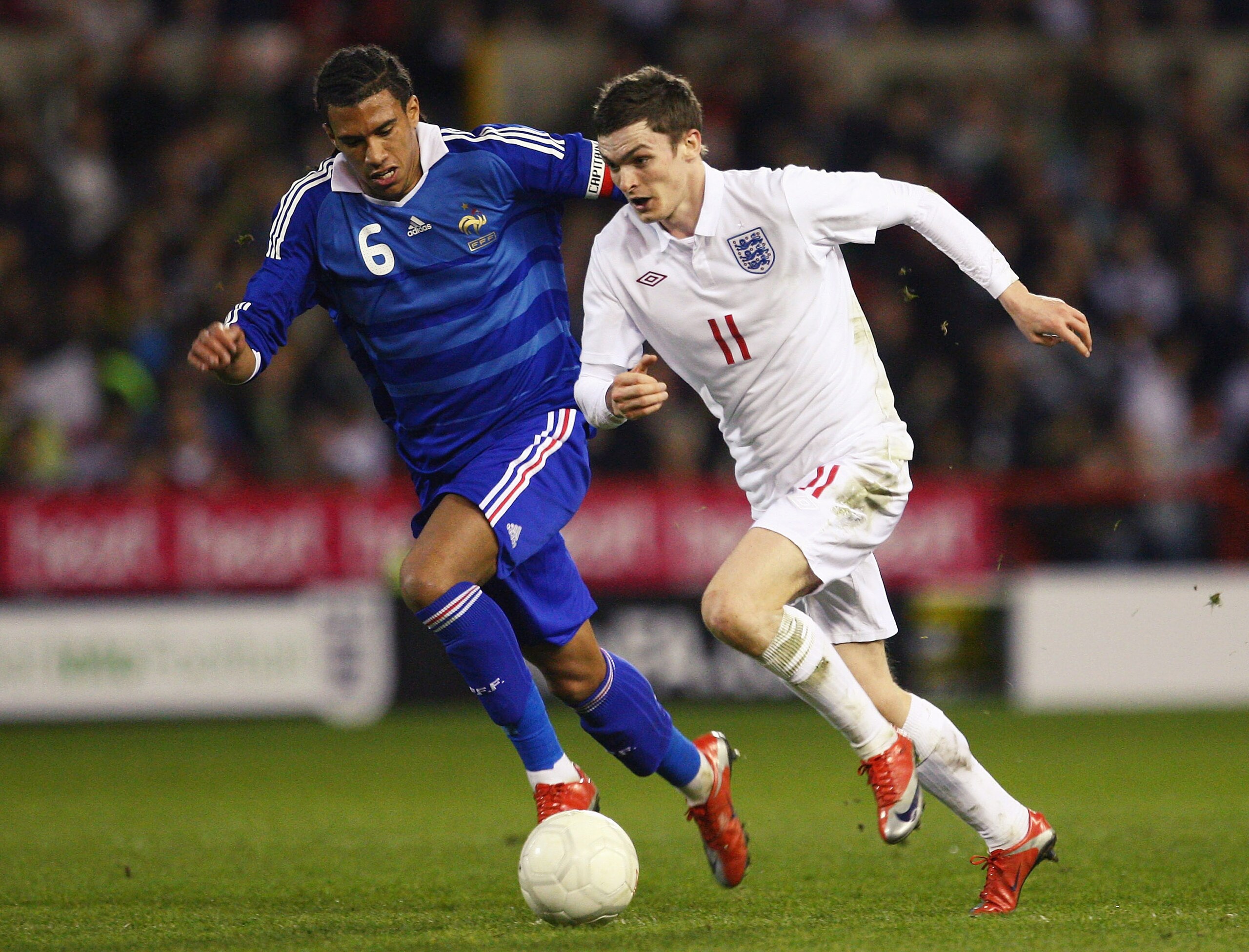 NOTTINGHAM, UNITED KINGDOM - MARCH 31: Etienne Capoue of France battles with Adam Johnson of England during the U-21 International Friendy Match between England and France at the City Ground on March 31, 2009 in Nottingham, England. (Photo by Laurence G NOTTINGHAM, UNITED KINGDOM - MARCH 31: Etienne Capoue of France battles with Adam Johnson of England during the U-21 International Friendy Match between England and France at the City Ground on March 31, 2009 in Nottingham, England. (Photo by Laurence G