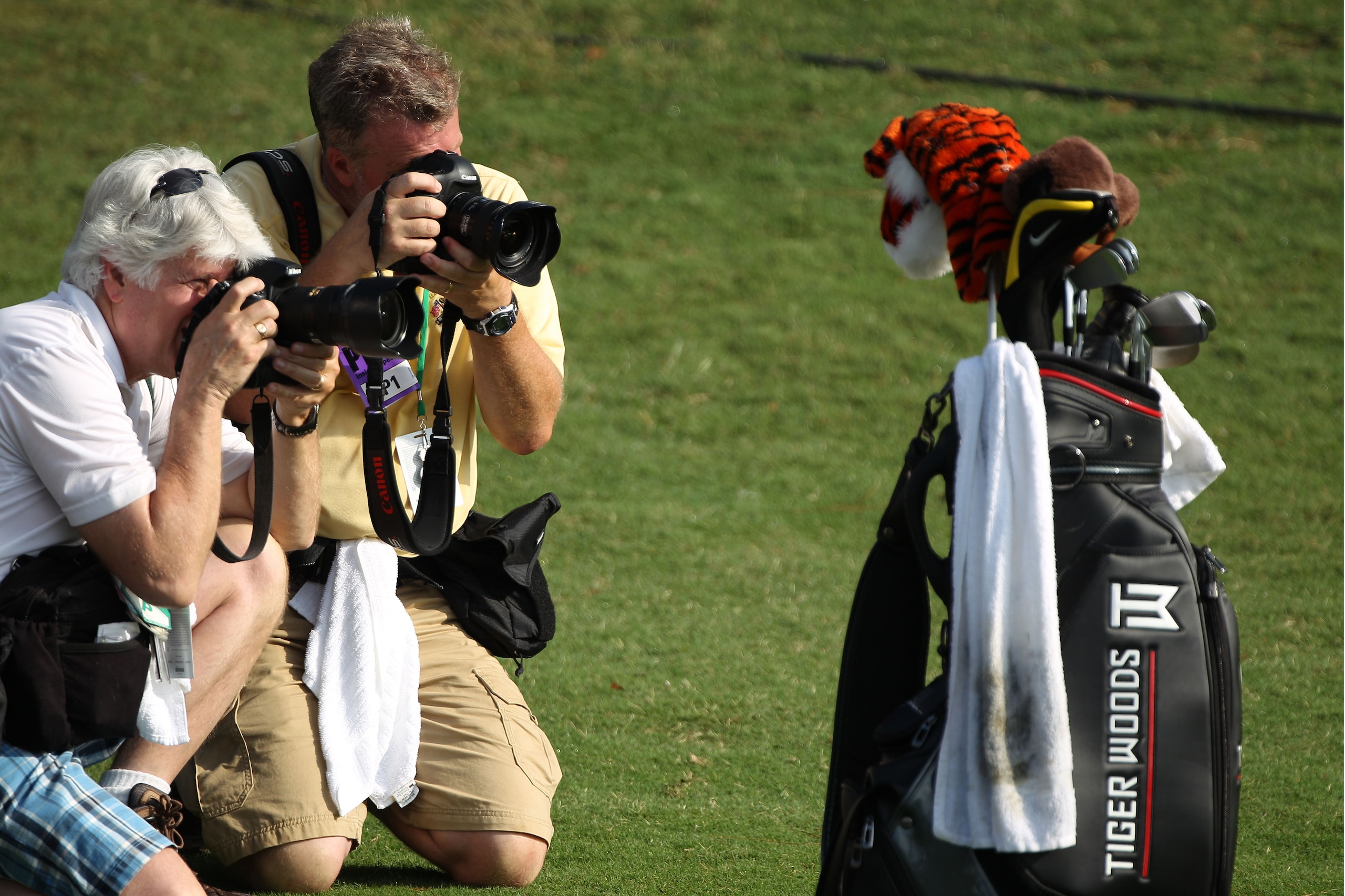 PONTE VEDRA BEACH, FL - MAY 05:  Photographers shoot Tiger Woods' golf bag during a practice round prior to the start of THE PLAYERS Championship held at THE PLAYERS Stadium course at TPC Sawgrass on May 5, 2010 in Ponte Vedra Beach, Florida.  (Photo by S