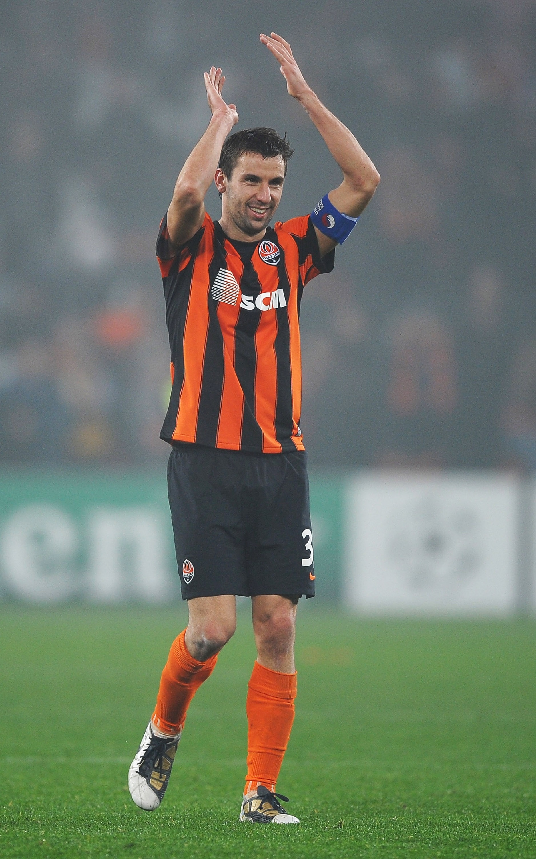 DONETSK, UKRAINE - NOVEMBER 03:  Darijo Srna of Shakhtar Donetsk celebrates victory after the Champions League Group H match between FC Shakhtar Donetsk and Arsenal at the Donbass Arena on November 3, 2010 in Donetsk, Ukraine.  (Photo by Laurence Griffith