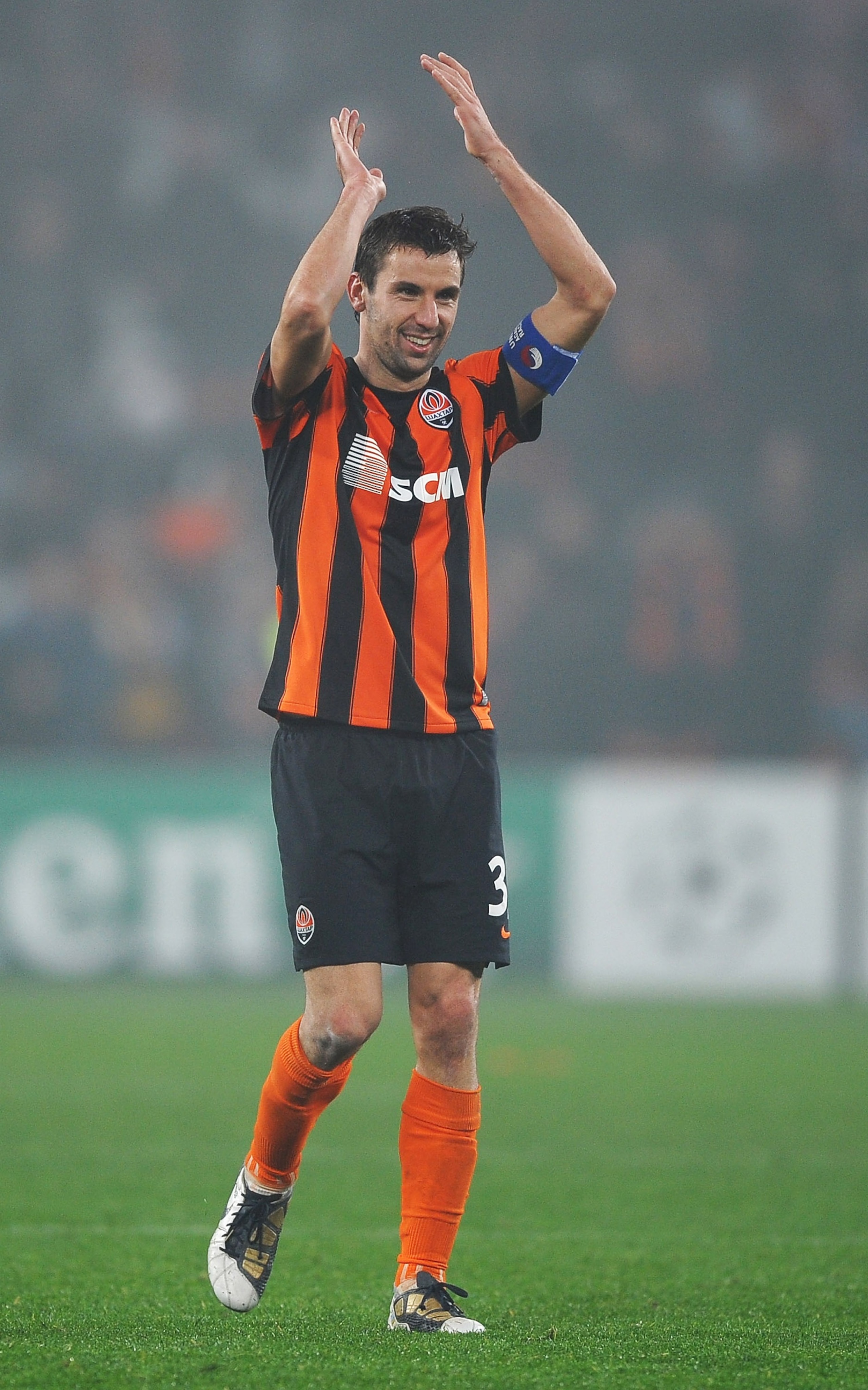 DONETSK, UKRAINE - NOVEMBER 03:  Darijo Srna of Shakhtar Donetsk celebrates victory after the Champions League Group H match between FC Shakhtar Donetsk and Arsenal at the Donbass Arena on November 3, 2010 in Donetsk, Ukraine.  (Photo by Laurence Griffith