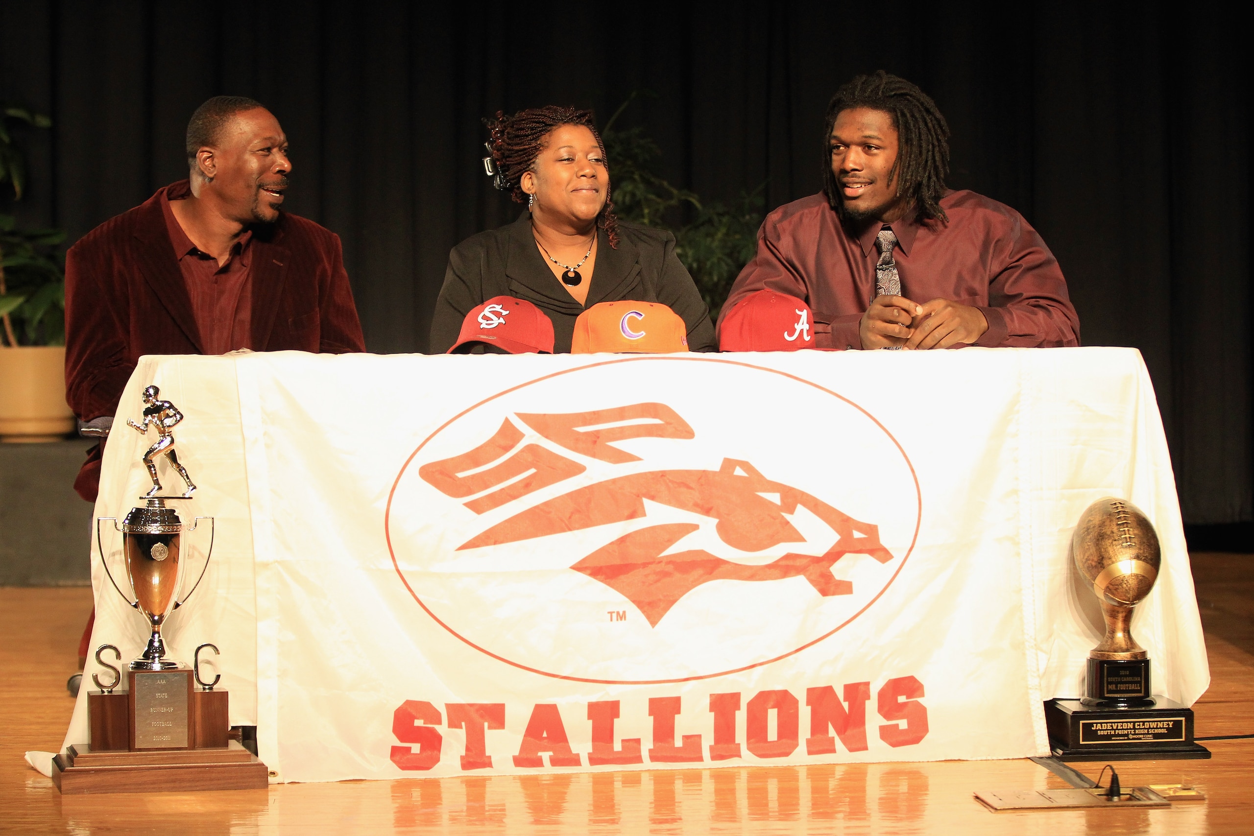ROCK HILL, SC - FEBRUARY 14:  Jadeveon Clowney announces his college football commitment to the University of South Carolina Gamecocks along side his mother Josenna Clowney and father David Clowney during a press conference at South Pointe High School on