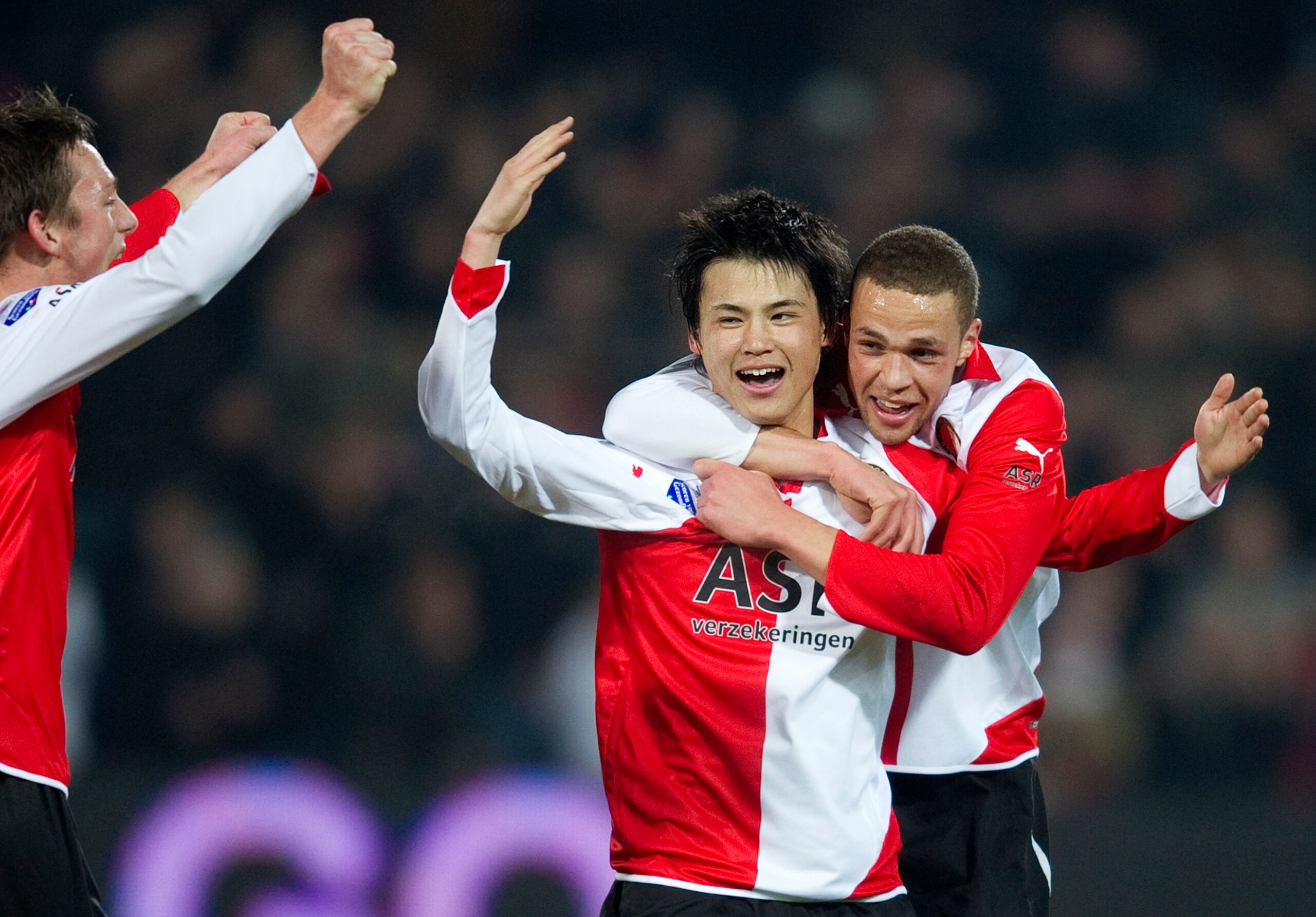 ROTTERDAM, NETHERLANDS - FEBRUARY 12: Ryo Miyaichi (C) celebrates with Luc Castaignos (R) after his goal (1-0) during the Eredivisie match between Feyenoord and Heracles at the Kuip on February 12, 2011 in Rotterdam, Netherlands. Feyenoord won with 2-1. ROTTERDAM, NETHERLANDS - FEBRUARY 12: Ryo Miyaichi (C) celebrates with Luc Castaignos (R) after his goal (1-0) during the Eredivisie match between Feyenoord and Heracles at the Kuip on February 12, 2011 in Rotterdam, Netherlands. Feyenoord won with 2-1.