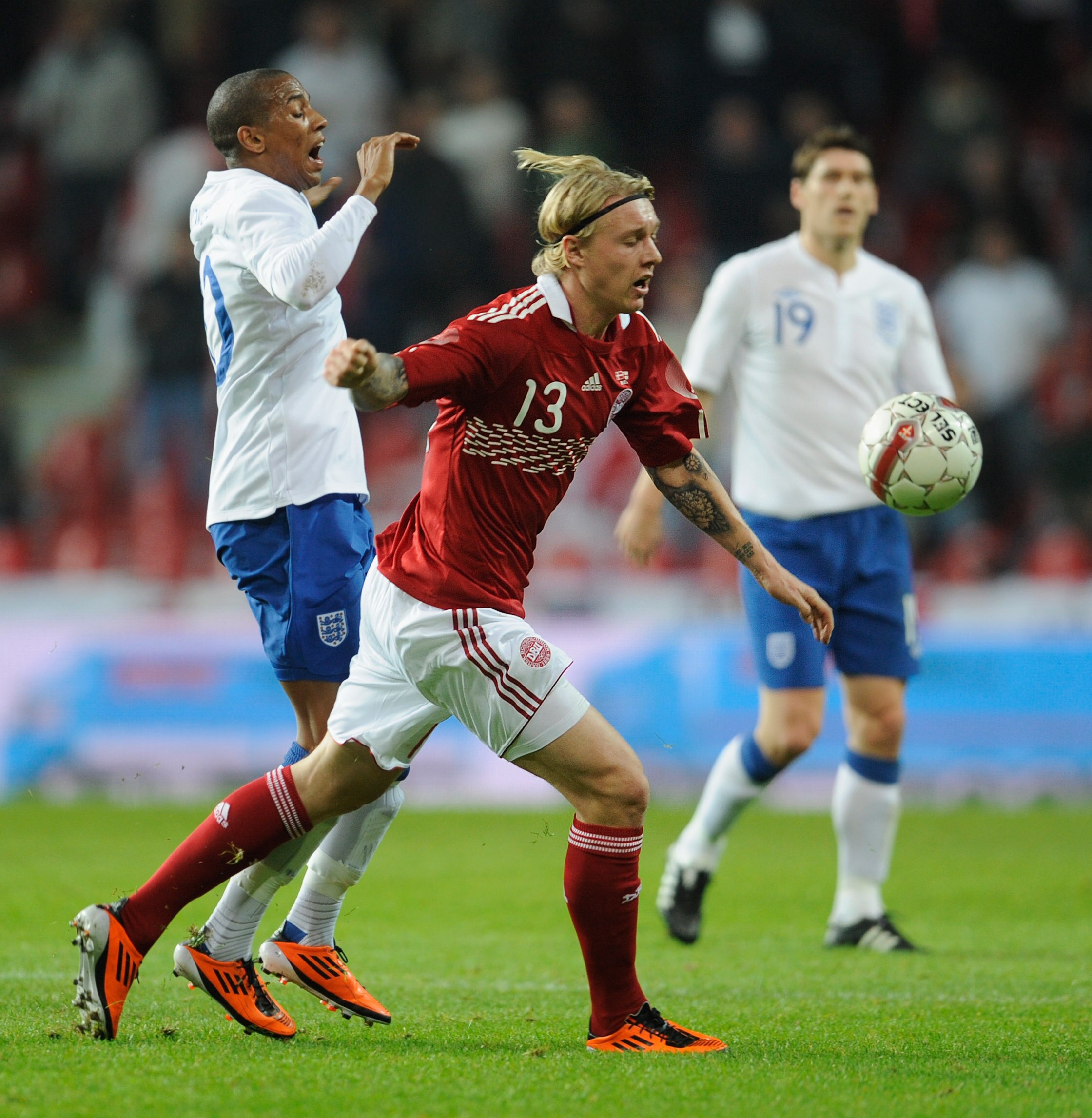 COPENHAGEN, DENMARK - FEBRUARY 09: Simon Kjaer of Denmark battles Ashley Young of England during the international friendly match between Denmark and England at Parken Stadium on February 9, 2011 in Copenhagen, .  (Photo by Michael Regan/Getty Images)