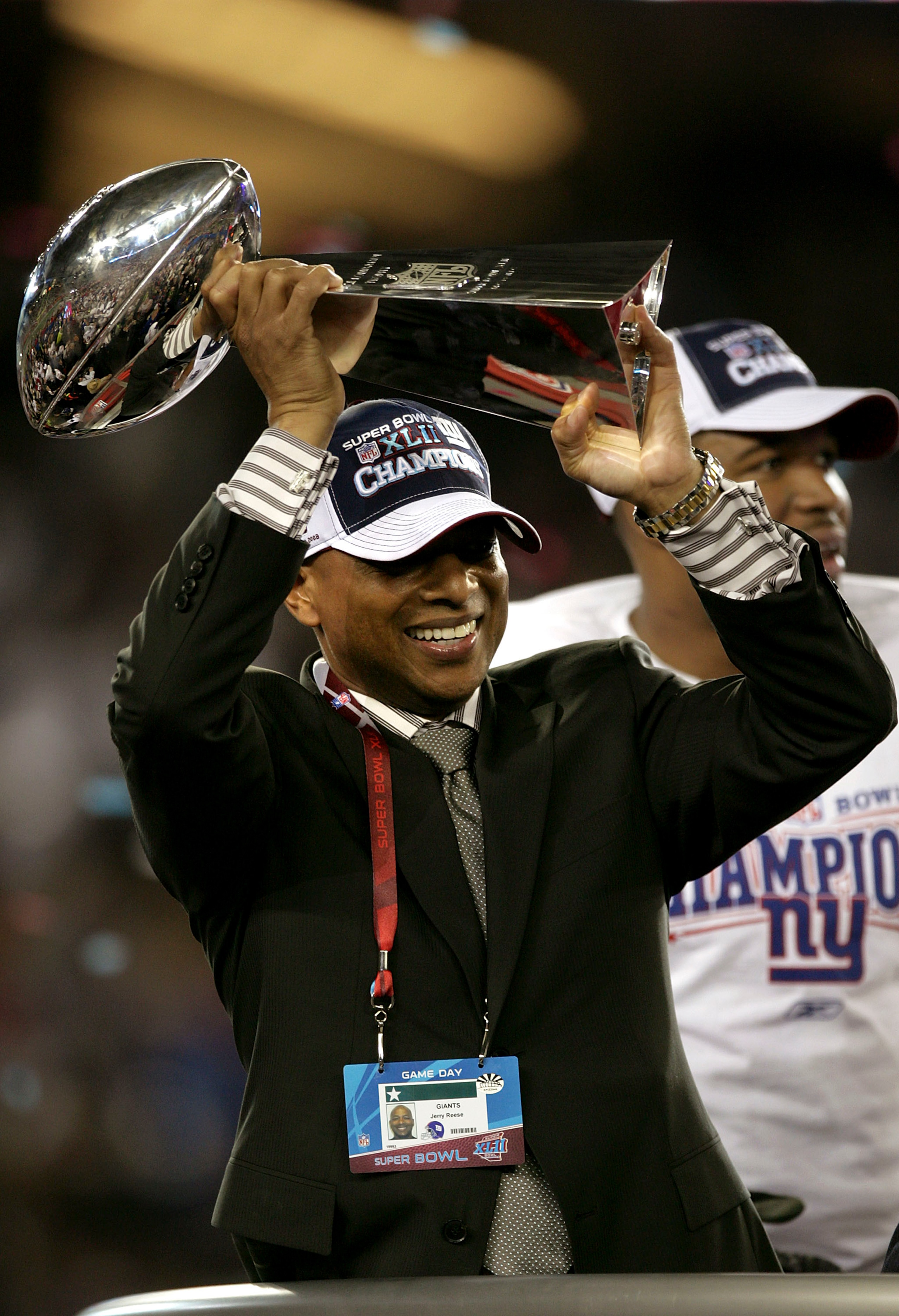 GLENDALE, AZ - FEBRUARY 03:  General Manager Jerry Reese of the New York Giants holds the Vince Lombardi Trophy after defeating the New England Patriots 17-14 in Super Bowl XLII on February 3, 2008 at the University of Phoenix Stadium in Glendale, Arizona